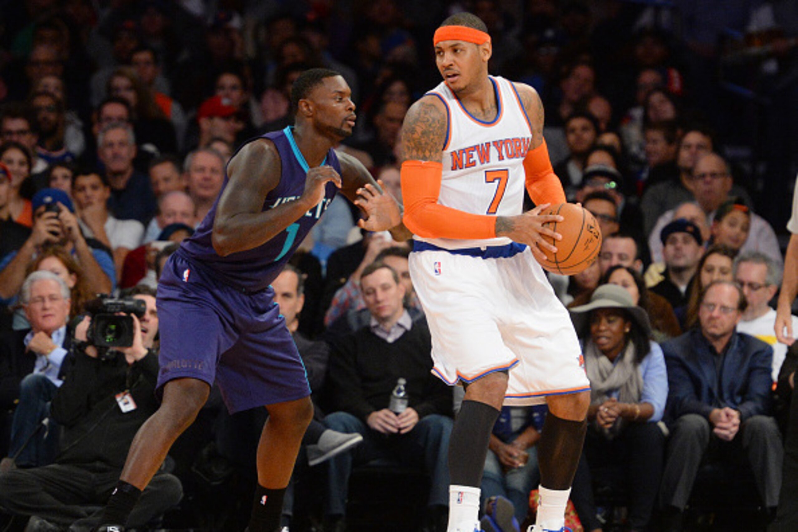 NEW YORK, NY - NOVEMBER 2: Carmelo Anthony #7 of the New York Knicks defends the ball against Lance Stephenson #1 of the Charlotte Hornets during the game on November 2, 2014 at Madison Square Garden in New York City, New York. NOTE TO USER: User expressl