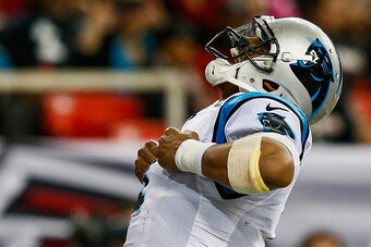 ATLANTA, GA - DECEMBER 28:  Cam Newton #1 of the Carolina Panthers celebrates a touchdown in the first half against the Atlanta Falcons at the Georgia Dome on December 28, 2014 in Atlanta, Georgia.  (Photo by Kevin C. Cox/Getty Images)