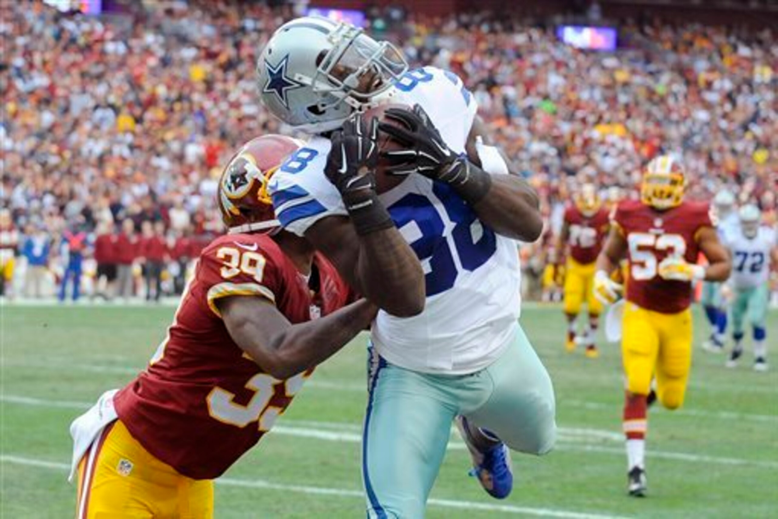 Dez Byrant has 16 touchdown receptions this season, surpassing Terrell Owens in the Cowboys' record books,.