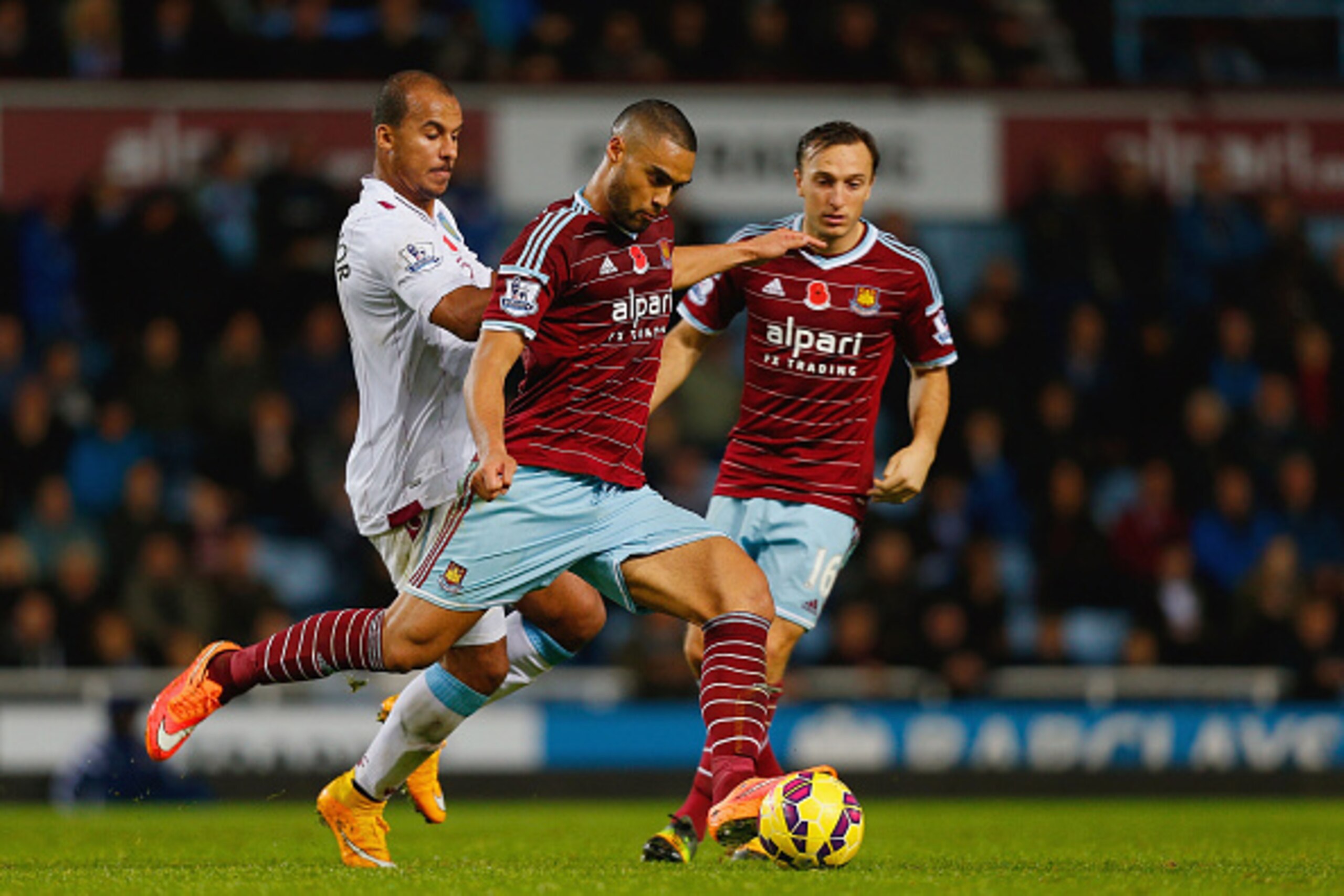 LONDON, ENGLAND - NOVEMBER 08: Winston Reid of West Ham United clears the ball from Gabriel Agbonlahor of Aston Villa during the Barclays Premier League match between West Ham United and Aston Villa at Boleyn Ground on November 8, 2014 in London, England LONDON, ENGLAND - NOVEMBER 08: Winston Reid of West Ham United clears the ball from Gabriel Agbonlahor of Aston Villa during the Barclays Premier League match between West Ham United and Aston Villa at Boleyn Ground on November 8, 2014 in London, England