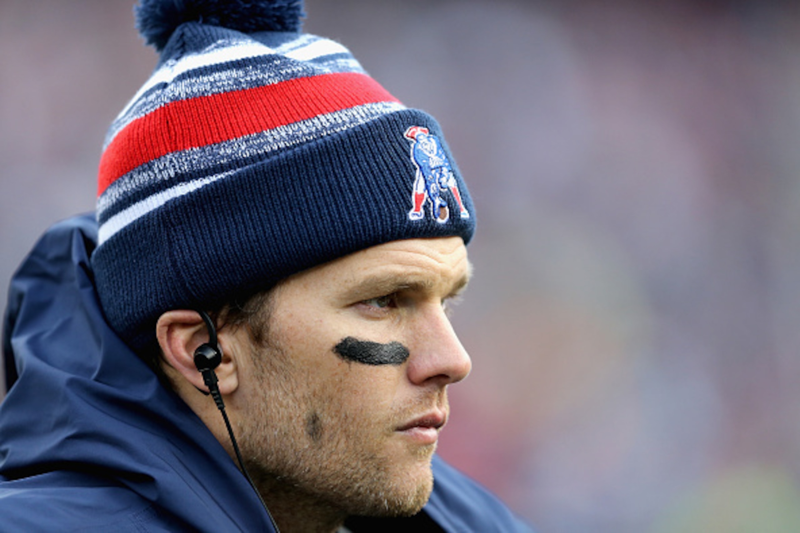 FOXBORO, MA - DECEMBER 28:  Tom Brady #12 of the New England Patriots looks on during the fourth quarter against the Buffalo Bills at Gillette Stadium on December 28, 2014 in Foxboro, Massachusetts.  (Photo by Jim Rogash/Getty Images)