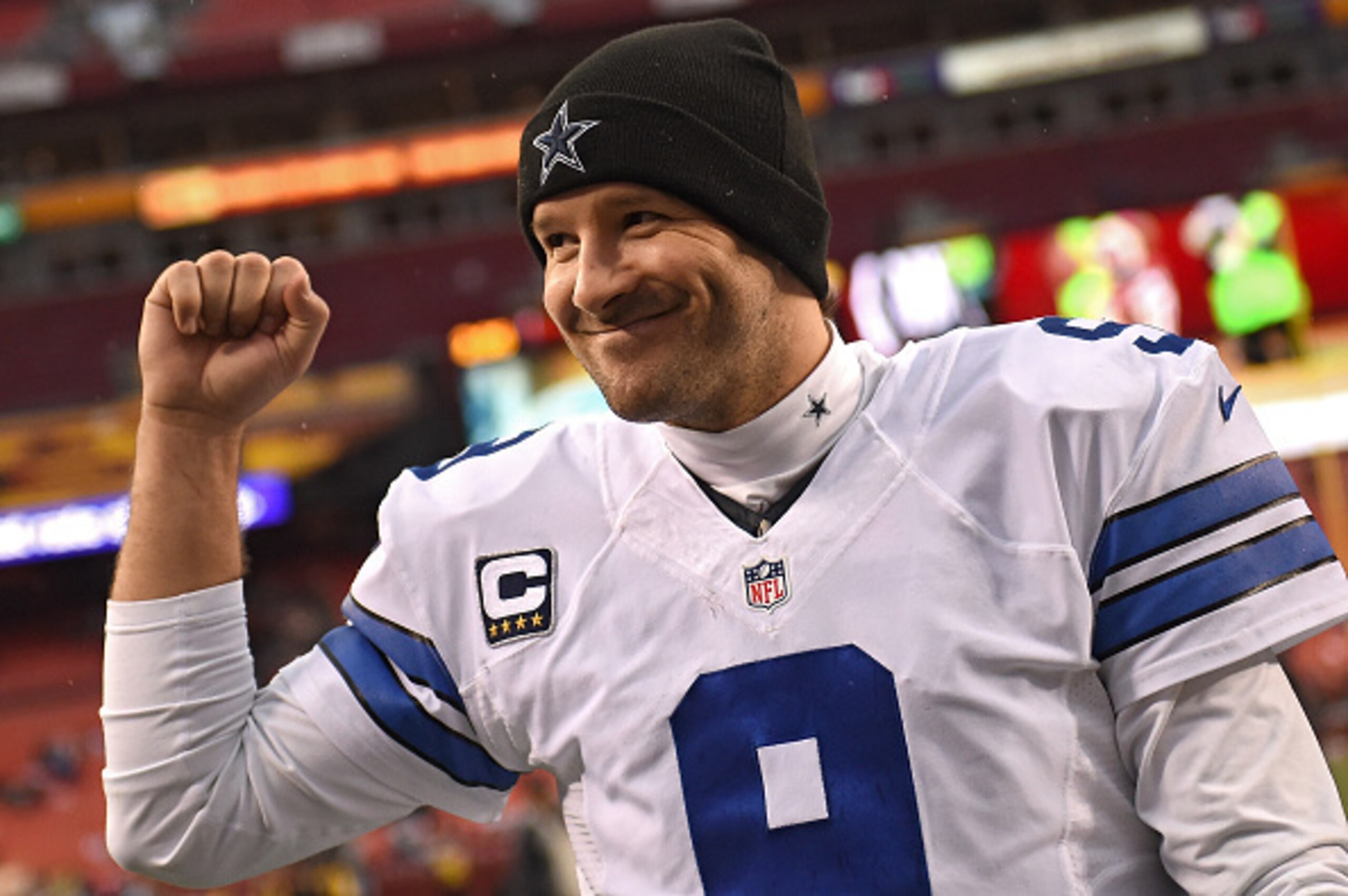 LANDOVER, MD - DECEMBER 28: Quarterback Tony Romo #9 of the Dallas Cowboys acknowledges the crowd after defeating the Washington Redskins at FedExField on December 28, 2014 in Landover, Maryland. The Dallas Cowboys won, 44-17. (Photo by Patrick Smith/Gett