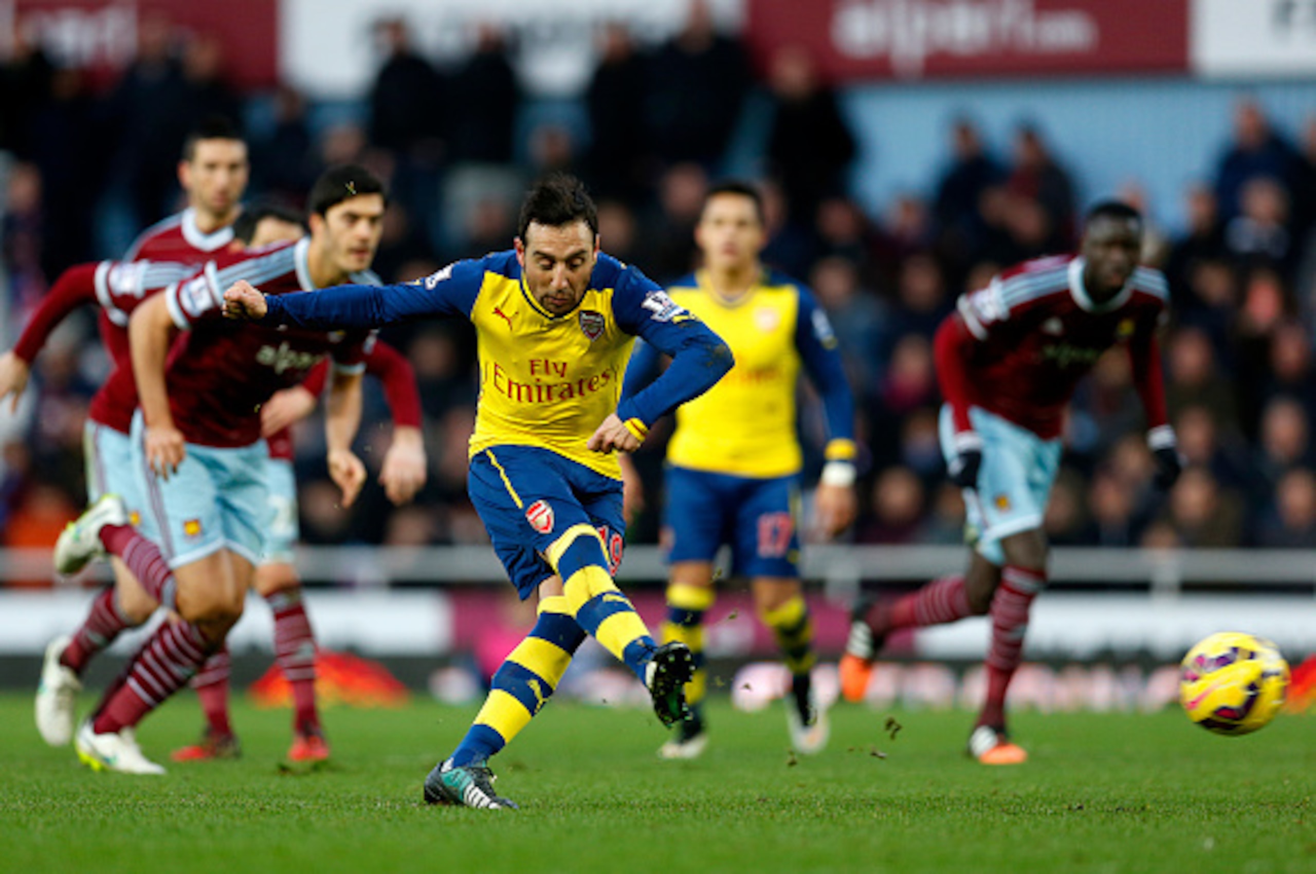 LONDON, ENGLAND - DECEMBER 28:  Santi Cazorla of Arsenal scores the opening goal from the penalty spot during the Barclays Premier League match between West Ham United and Arsenal at Boleyn Ground on December 28, 2014 in London, England.  (Photo by Steve 