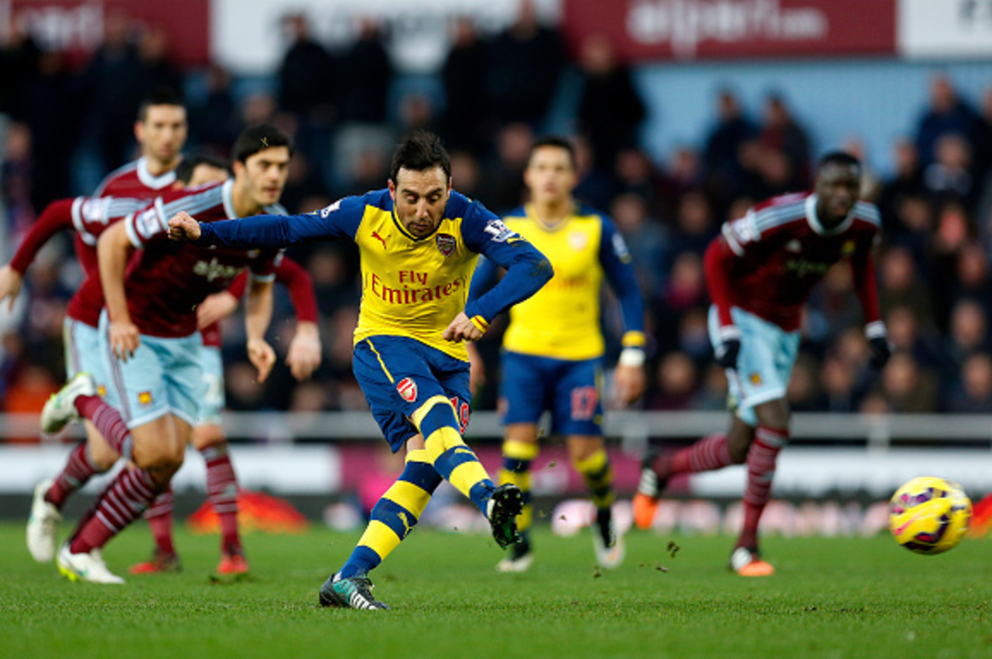 LONDON, ENGLAND - DECEMBER 28:  Santi Cazorla of Arsenal scores the opening goal from the penalty spot during the Barclays Premier League match between West Ham United and Arsenal at Boleyn Ground on December 28, 2014 in London, England.  (Photo by Steve 