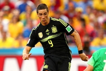 CURITIBA, BRAZIL - JUNE 23:  Fernando Torres of Spain scores his team's second goal past Mathew Ryan of Australia during the 2014 FIFA World Cup Brazil Group B match between Australia and Spain at Arena da Baixada on June 23, 2014 in Curitiba, Brazil.  (P
