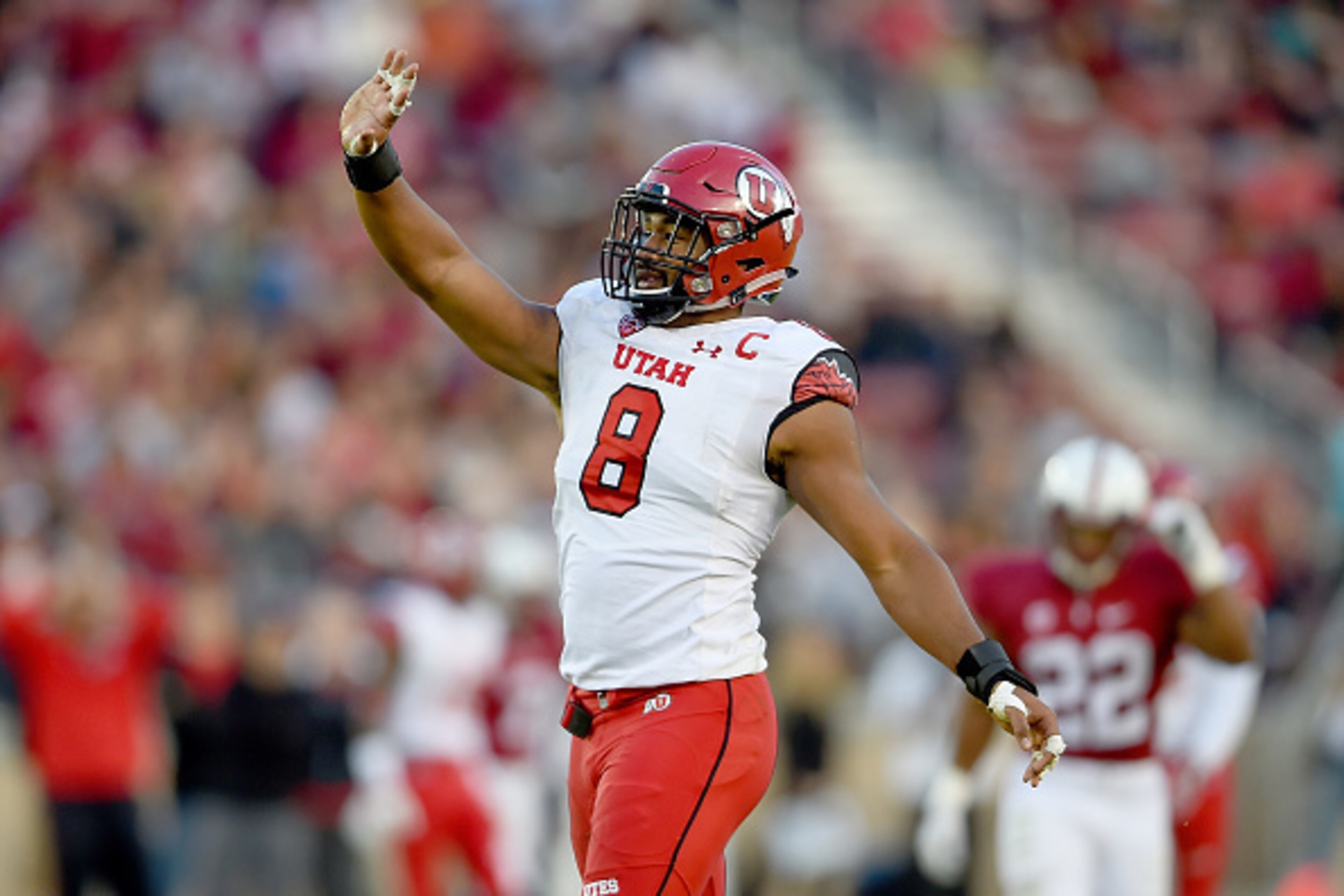 PALO ALTO, CA - NOVEMBER 15:  Nate Orchard #8 of the Utah Utes celebrates after sacking quarterback Kevin Hogan #8 of the Stanford Cardinal in the second quarter at Stanford Stadium on November 15, 2014 in Palo Alto, California.  (Photo by Thearon W. Hend