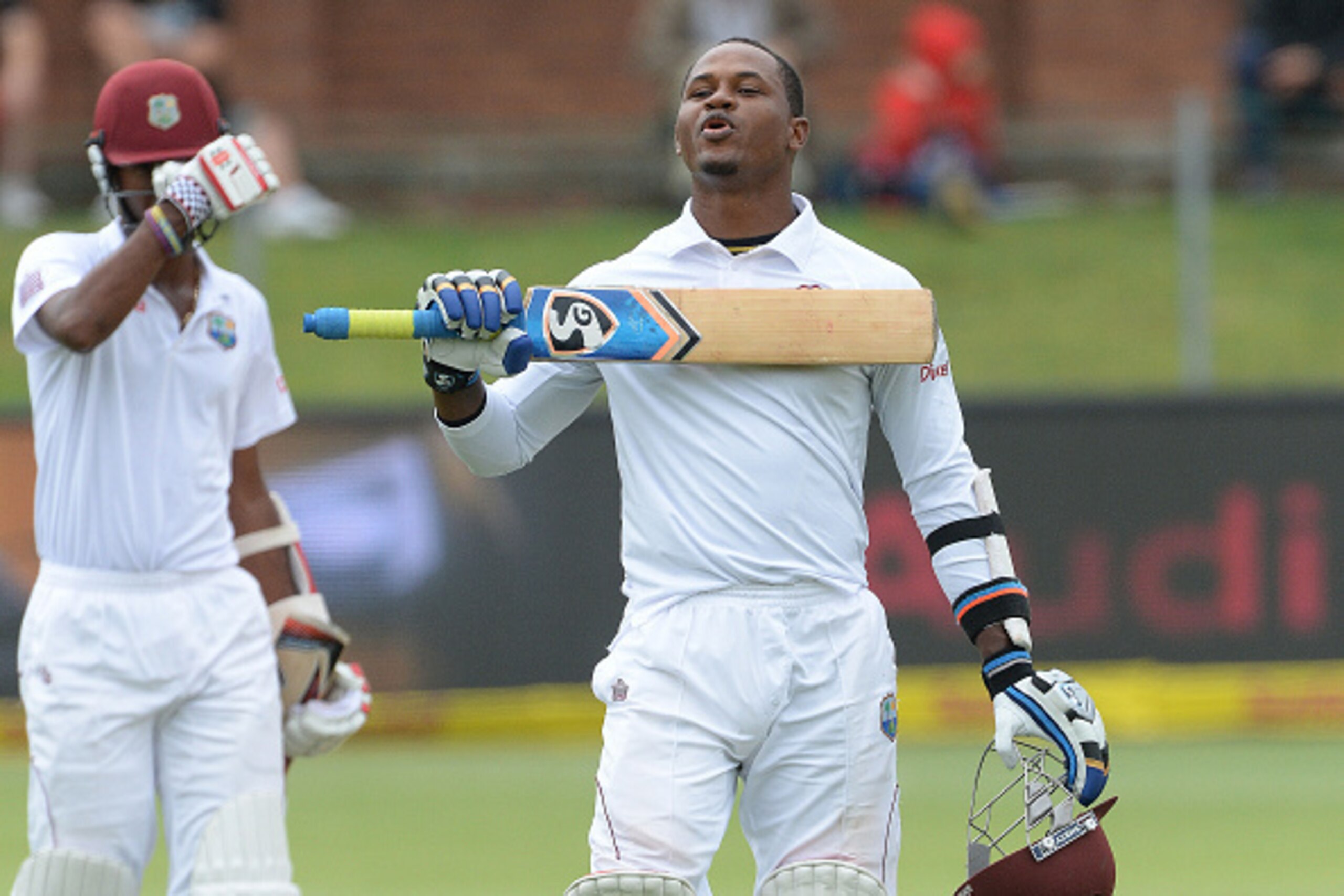 PORT ELIZABETH, SOUTH AFRICA - DECEMBER 29: Marlon Samuels celebrates his century during day 4 of the 2nd Test match between South Africa and West Indies at St. Georges Park on December 29, 2014 in Port Elizabeth, South Africa. (Photo by Duif du Toit/Gall