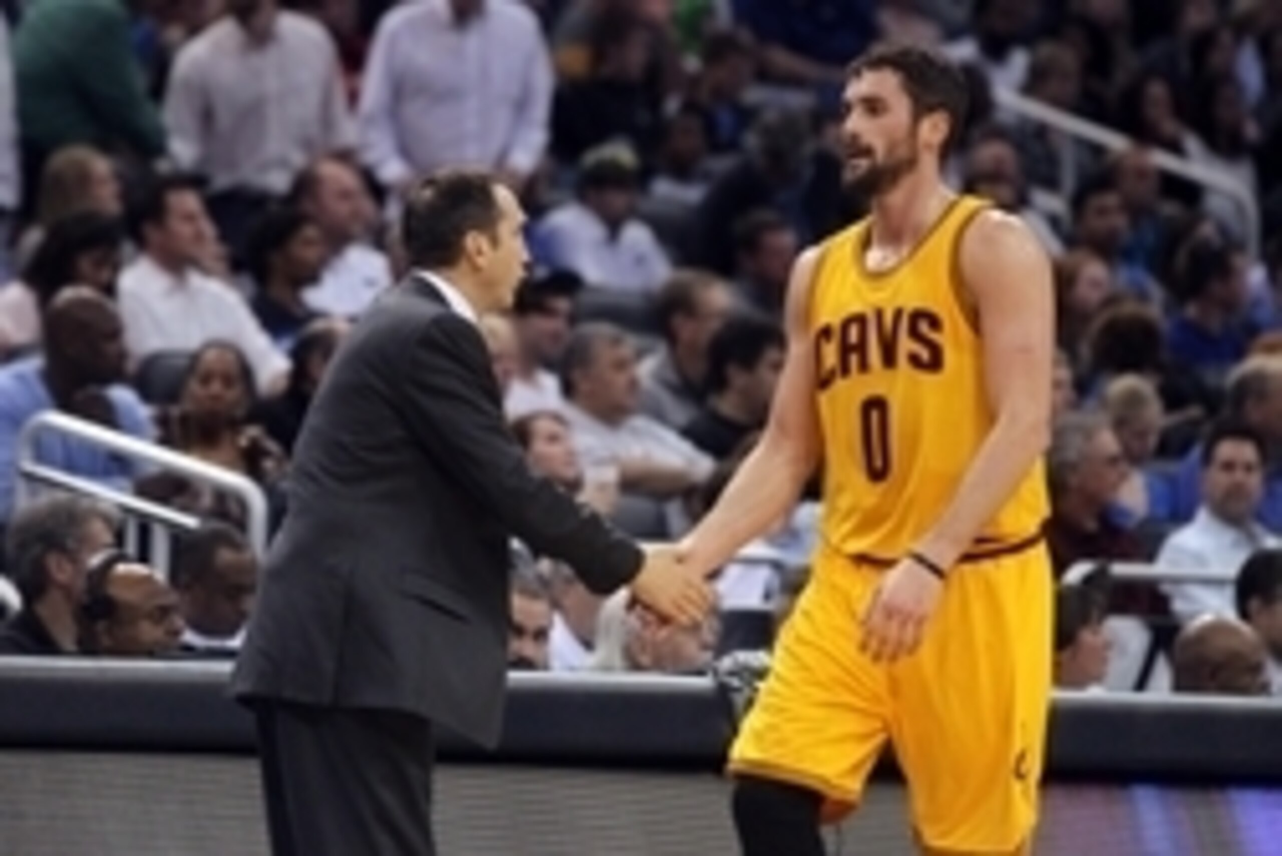 Dec 26, 2014; Orlando, FL, USA; Cleveland Cavaliers head coach David Blatt high fives forward Kevin Love (0) against the Orlando Magic during the first quarter at Amway Center. Mandatory Credit: Kim Klement-USA TODAY Sports