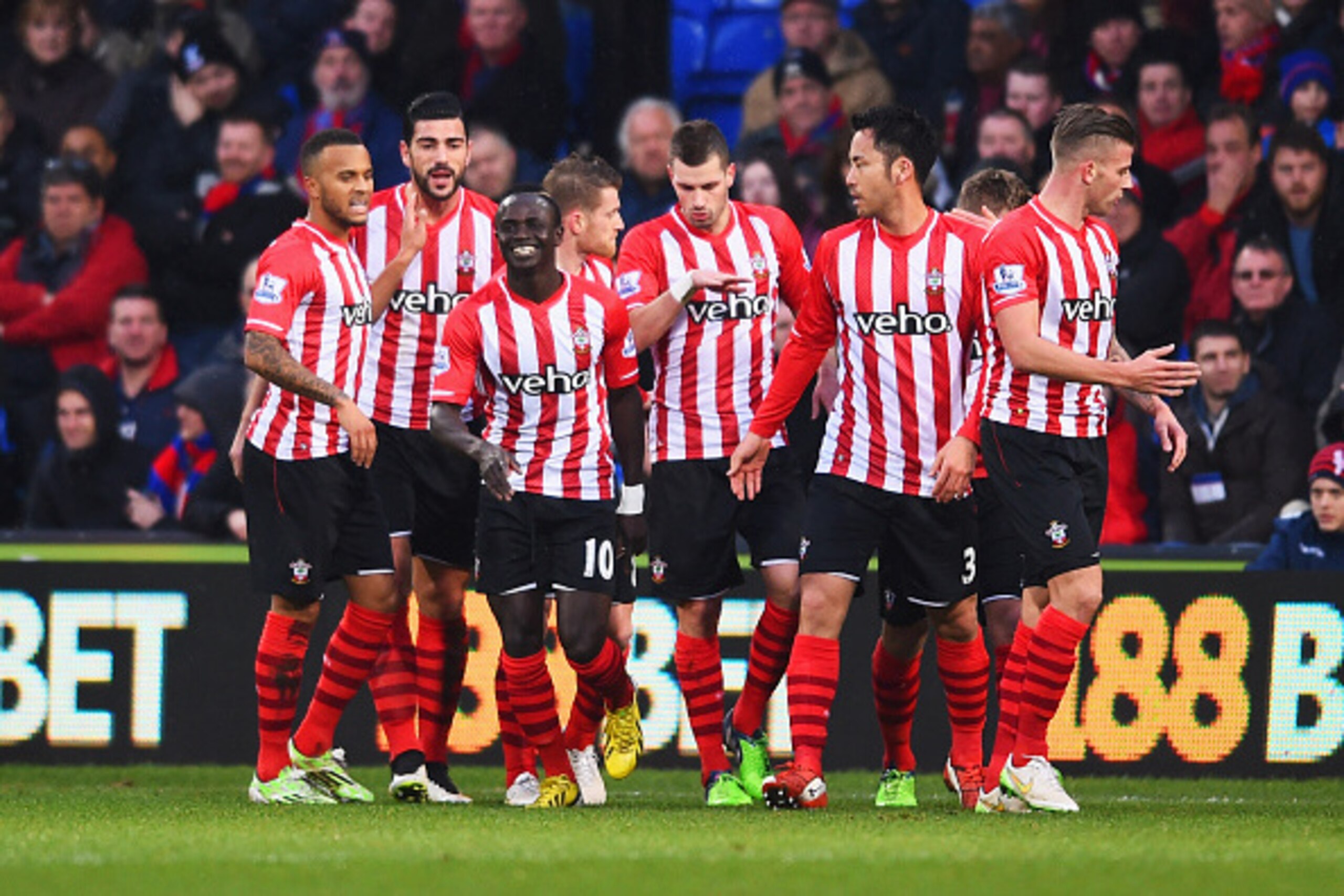 LONDON, ENGLAND - DECEMBER 26:  
Sadio Mane of Southampton (10) celebrates with team mates after scoring their first goal during the Barclays Premier League match between Crystal Palace and Southampton at Selhurst Park on December 26, 2014 in London, Engl
