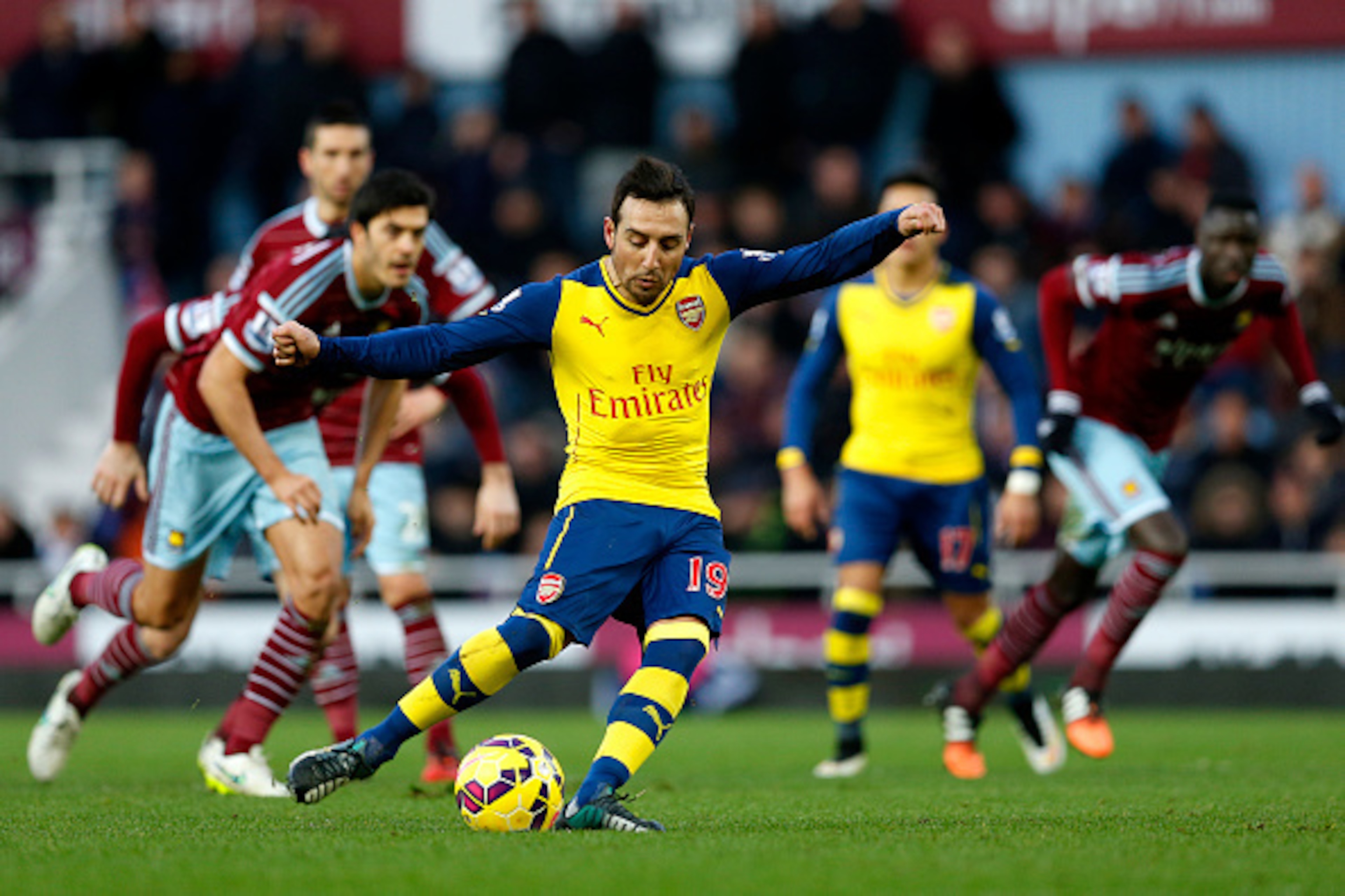 LONDON, ENGLAND - DECEMBER 28:  Santi Cazorla of Arsenal scores the opening goal from the penalty spot during the Barclays Premier League match between West Ham United and Arsenal at Boleyn Ground on December 28, 2014 in London, England.  (Photo by Steve 