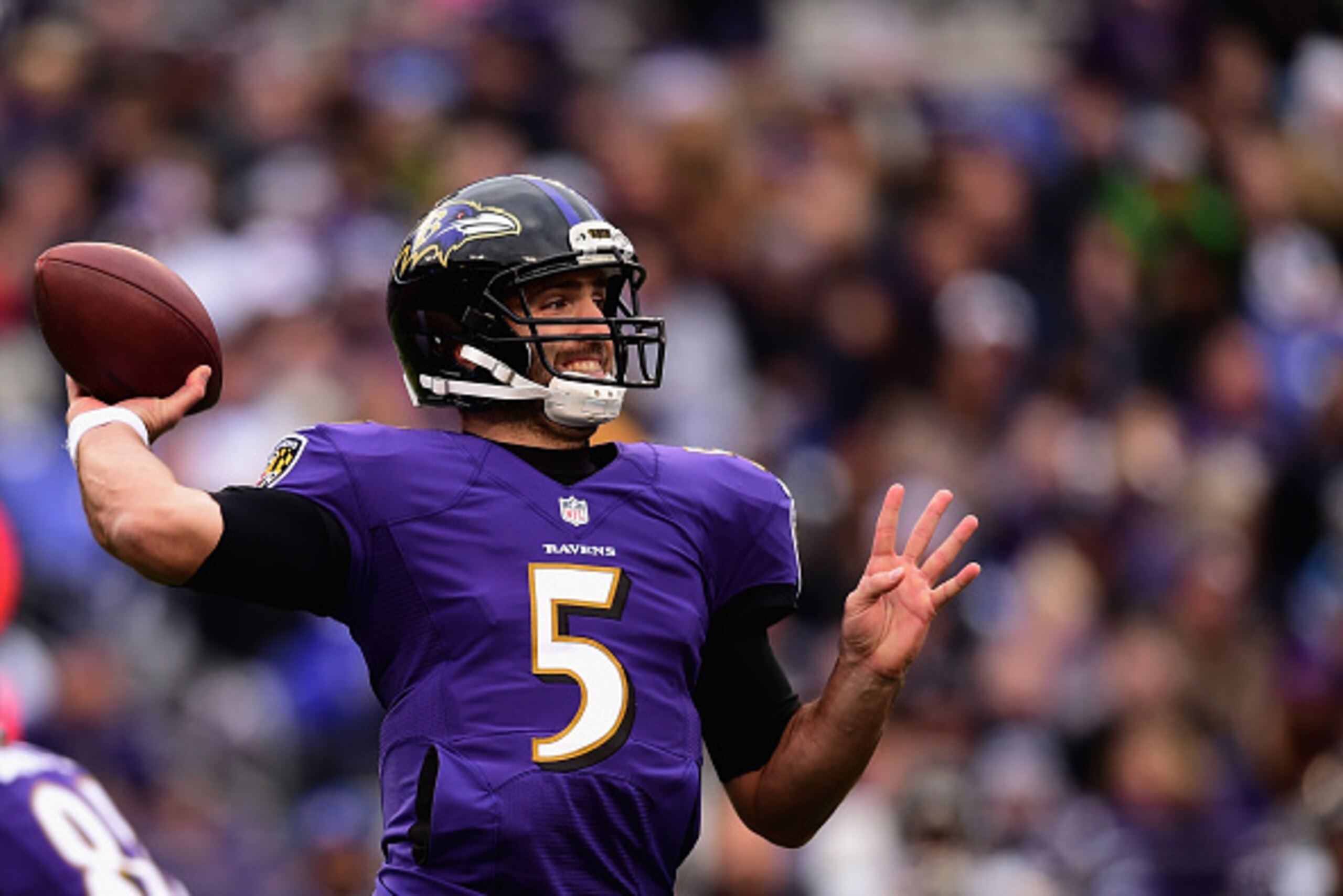 BALTIMORE, MD - DECEMBER 14:  Quarterback Joe Flacco #5 of the Baltimore Ravens throws a pass in the third quarter of a game against the Jacksonville Jaguars at M&T Bank Stadium on December 14, 2014 in Baltimore, Maryland.  (Photo by Patrick Smith/Getty I