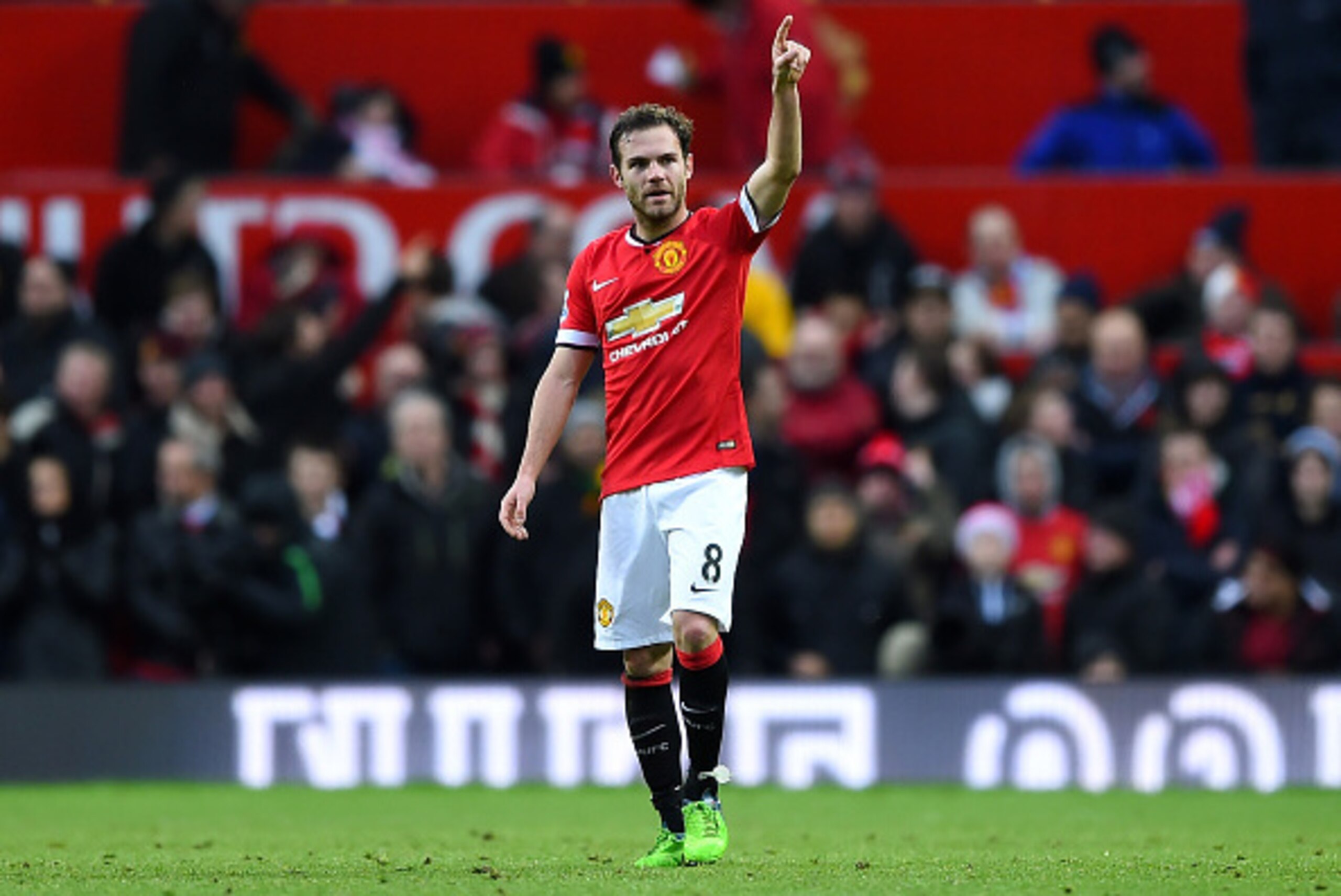 MANCHESTER, ENGLAND - DECEMBER 14:  Juan Mata of Manchester United celebrates scoring the second goal during the Barclays Premier League match between Manchester United and Liverpool at Old Trafford on December 14, 2014 in Manchester, England.  (Photo by 