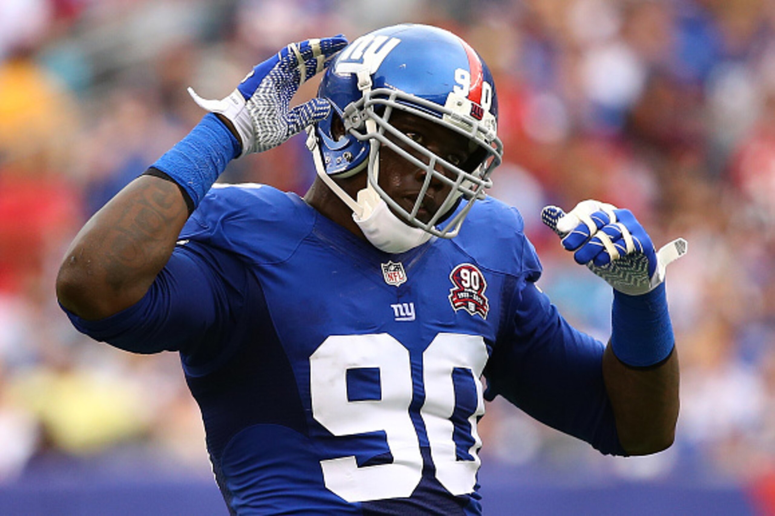 EAST RUTHERFORD, NJ - SEPTEMBER 21: Jason Pierre-Paul #90 of the New York Giants reacts against the Houston Texans at MetLife Stadium on September 21, 2014 in East Rutherford, New Jersey. (Photo by Al Bello/Getty Images) EAST RUTHERFORD, NJ - SEPTEMBER 21: Jason Pierre-Paul #90 of the New York Giants reacts against the Houston Texans at MetLife Stadium on September 21, 2014 in East Rutherford, New Jersey. (Photo by Al Bello/Getty Images)
