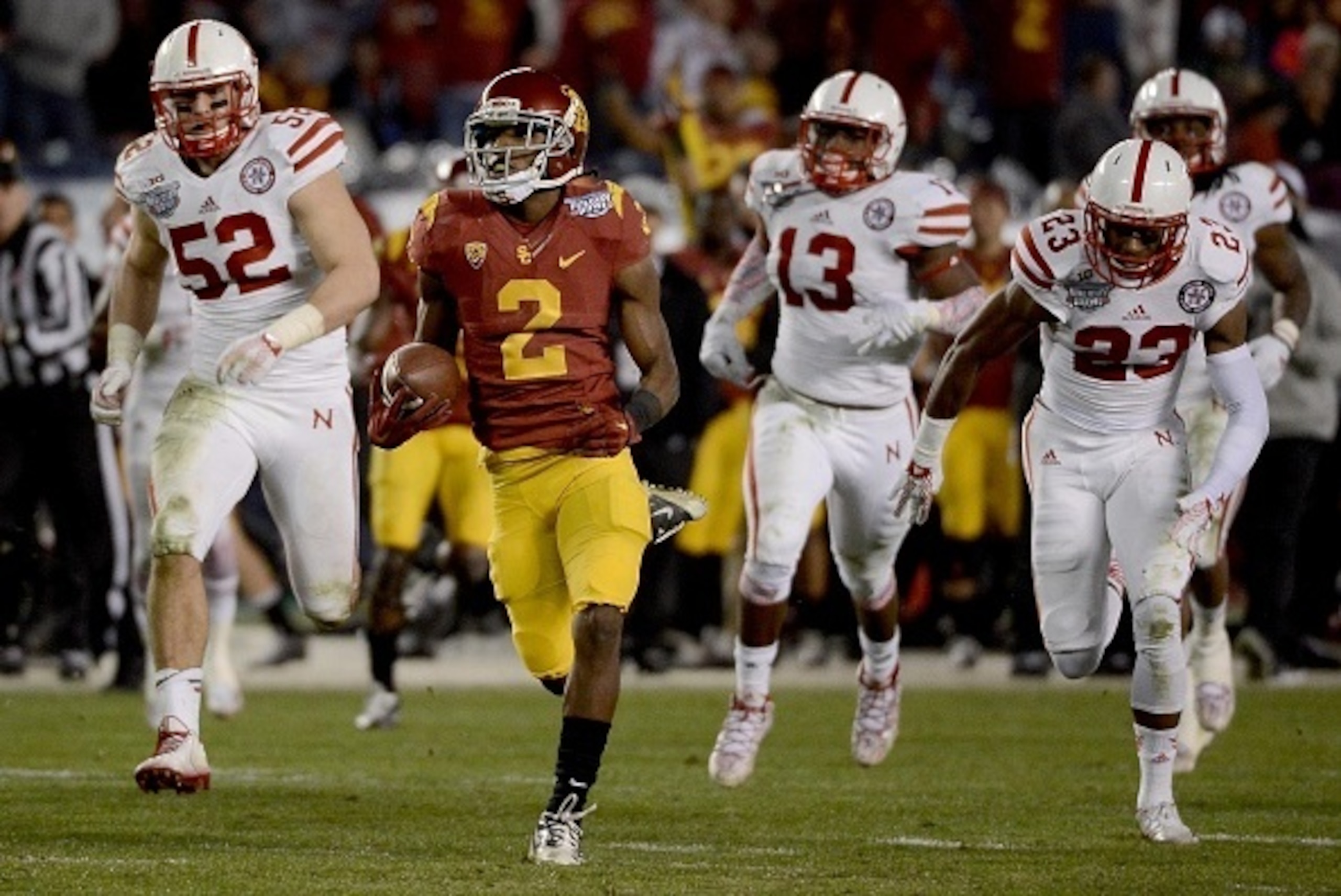SAN DIEGO, CA-  DECEMBER 27:  Adoree' Jackson #2 of the USC Trojans runs for a touchdown en route to his team's 45-42 win over the Nebraska Cornhuskers during the 2nd half of the National University Holiday Bowl on December 27, 2014 at Qualcomm Stadium in