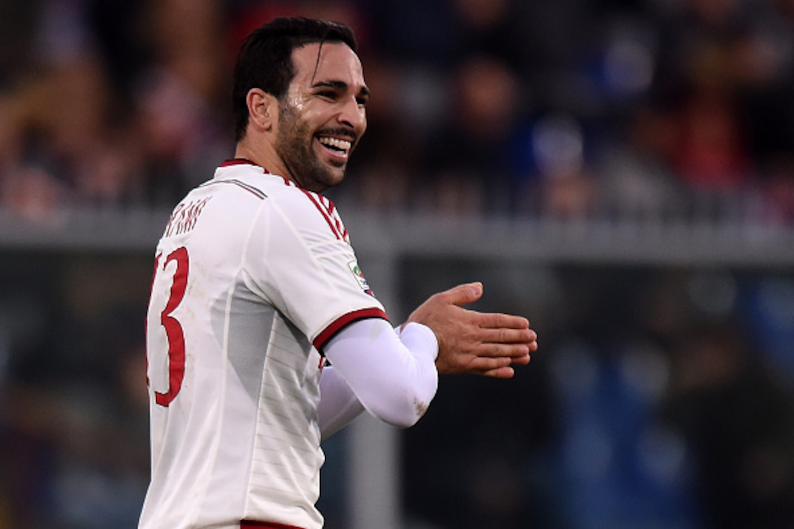 GENOA, ITALY - DECEMBER 07:  Adil Rami of Milan in action during the Serie A match between Genoa CFC and AC Milan at Stadio Luigi Ferraris on December 7, 2014 in Genoa, Italy.  (Photo by Tullio M. Puglia/Getty Images)