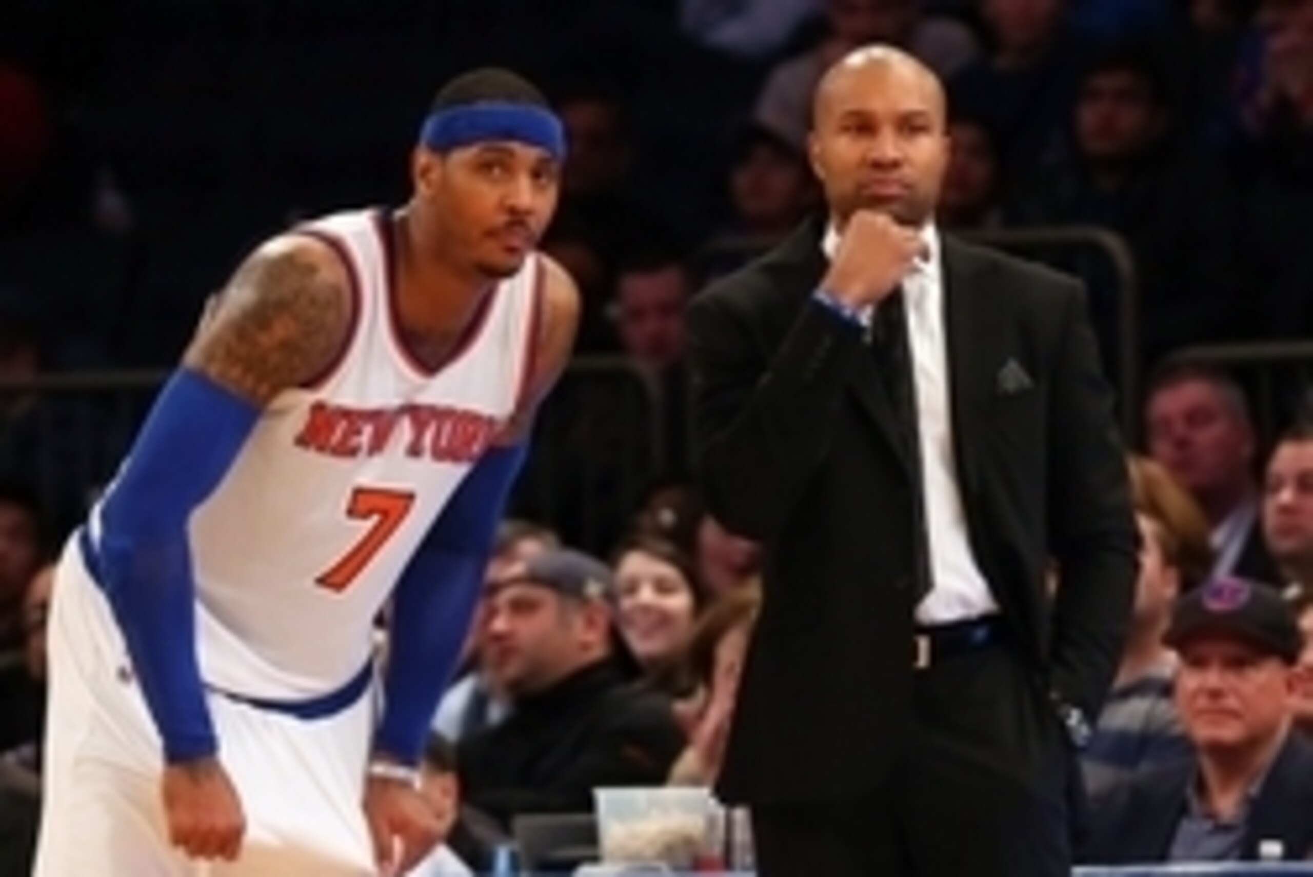 Dec 14, 2014; New York, NY, USA;  New York Knicks forward Carmelo Anthony (7) and head coach Derek Fisher during overtime against the Toronto Raptors at Madison Square Garden. Toronto Raptors won 95-90 in overtime. Mandatory Credit: Anthony Gruppuso-USA T