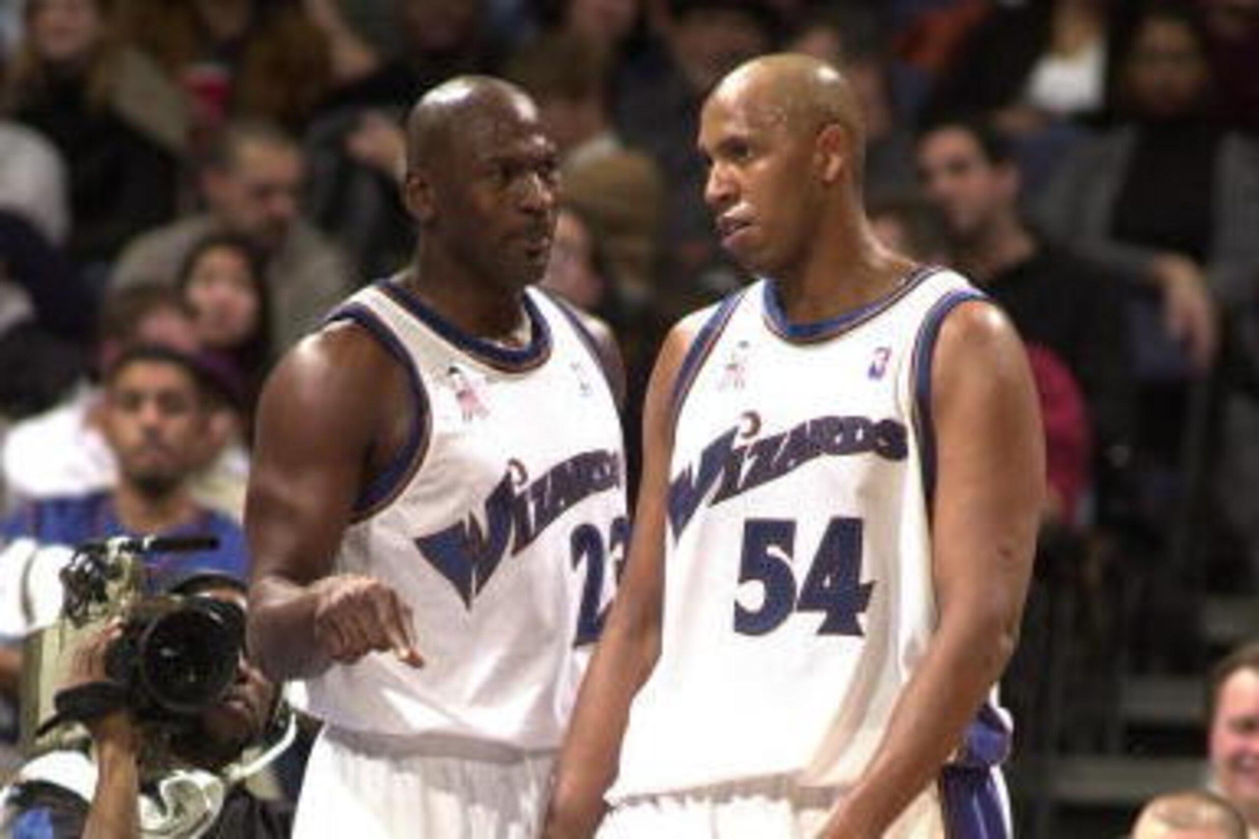 29 DEC 2001:  Michael Jordan #23 and Popeye Jones #54 of the Washington Wizards talk about game plan during a timeout against the Charlotte Hornets at the MCI Center in Washington, D.C. DIGITAL IMAGE NOTE TO USER: User expressly acknowledges and agrees th