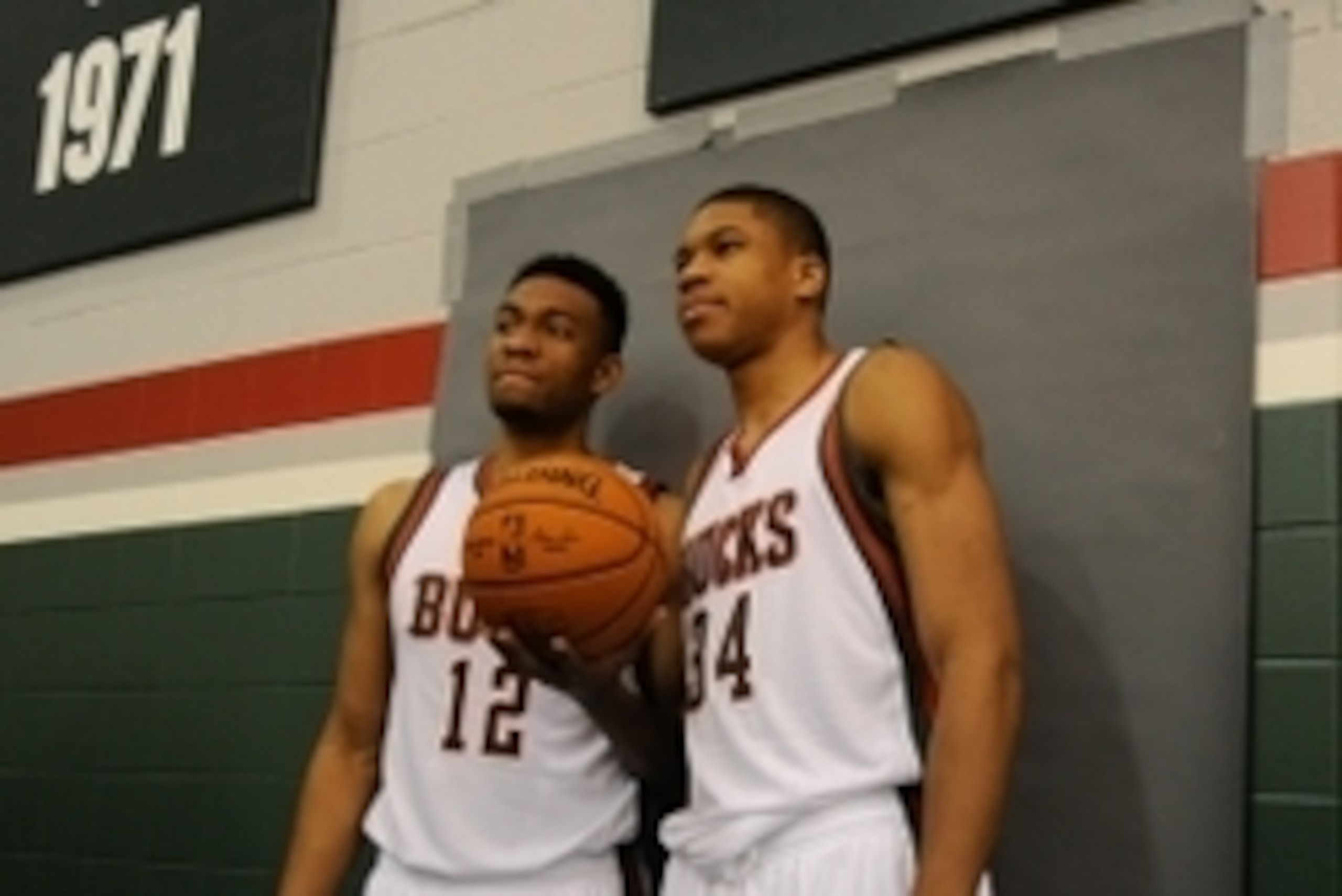 Sep 29, 2014; Milwaukee, WI, USA; Milwaukee Bucks players Jabari Parker (left) and Giannis Antetokounmpo pose for a picture during media day at the Cousins Center. Mandatory Credit: Benny Sieu-USA TODAY Sports