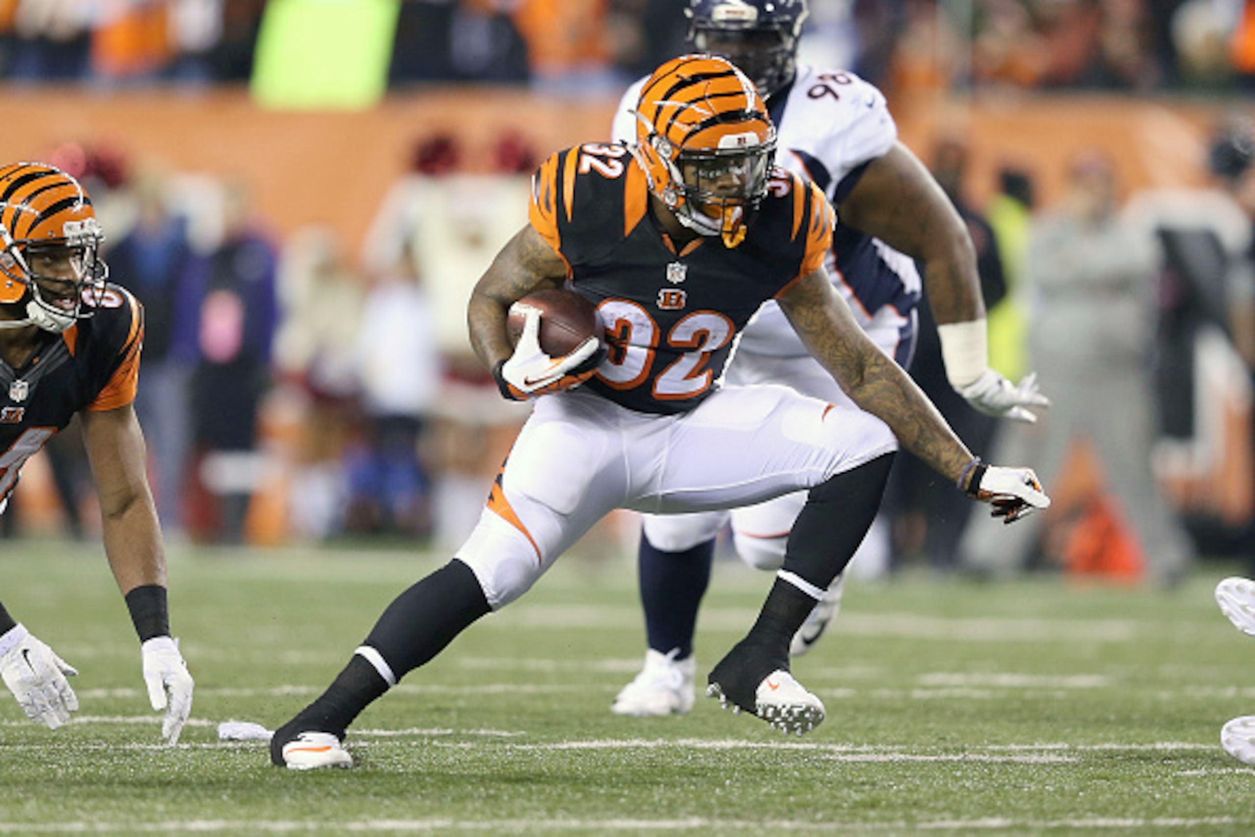 CINCINNATI, OH - DECEMBER 22:  Jeremy Hill #32 of the Cincinnati Bengals carries the ball during the second quarter of the game against the Denver Broncos at Paul Brown Stadium on December 22, 2014 in Cincinnati, Ohio. (Photo by Andy Lyons/Getty Images)