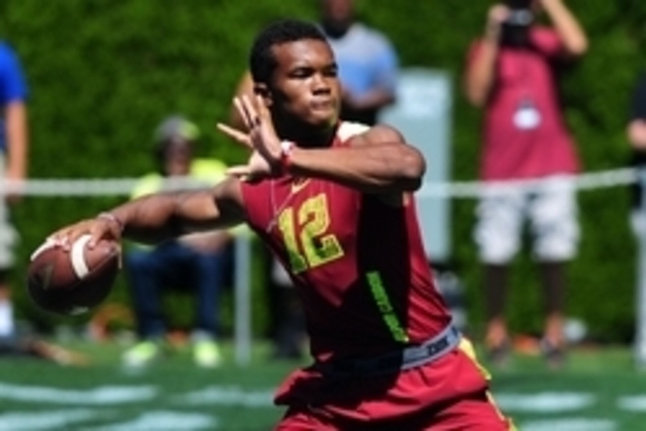 Jul 9, 2014; Beaverton, OR, USA; Vapor Carbon quarterback Kyler Murray (12) passes the ball during Nike Football ' The Opening' at Nike World Headquarters. Mandatory Credit: Steve Dykes-USA TODAY Sports