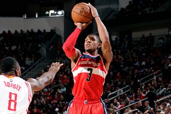 HOUSTON, TX -  DECEMBER 29: Bradley Beal #3 of the Washington Wizards shoots against the Houston Rockets on December 29, 2014 at Toyota Center in Houston, Texas. NOTE TO USER: User expressly acknowledges and agrees that, by downloading and or using this P