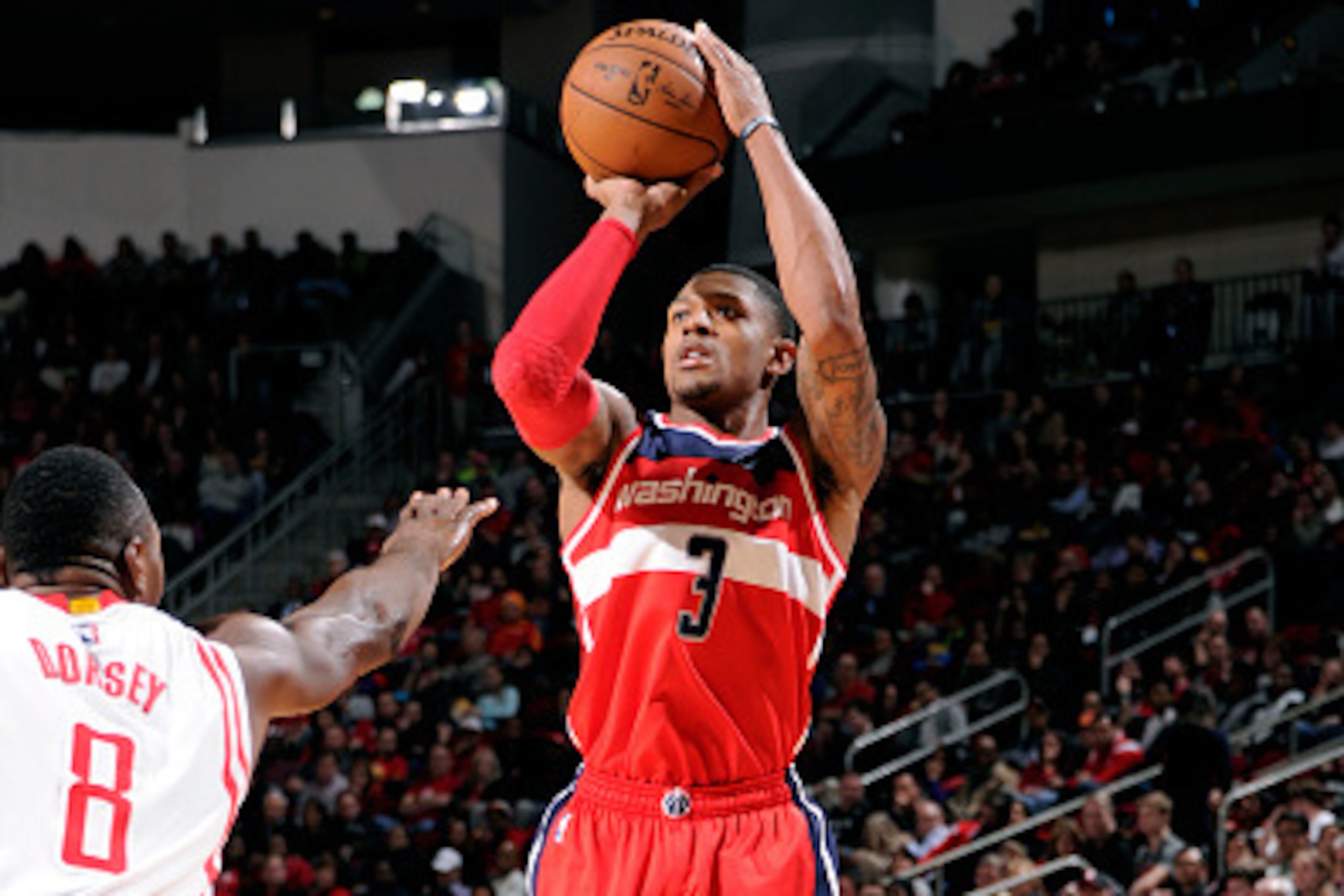 HOUSTON, TX -  DECEMBER 29: Bradley Beal #3 of the Washington Wizards shoots against the Houston Rockets on December 29, 2014 at Toyota Center in Houston, Texas. NOTE TO USER: User expressly acknowledges and agrees that, by downloading and or using this P