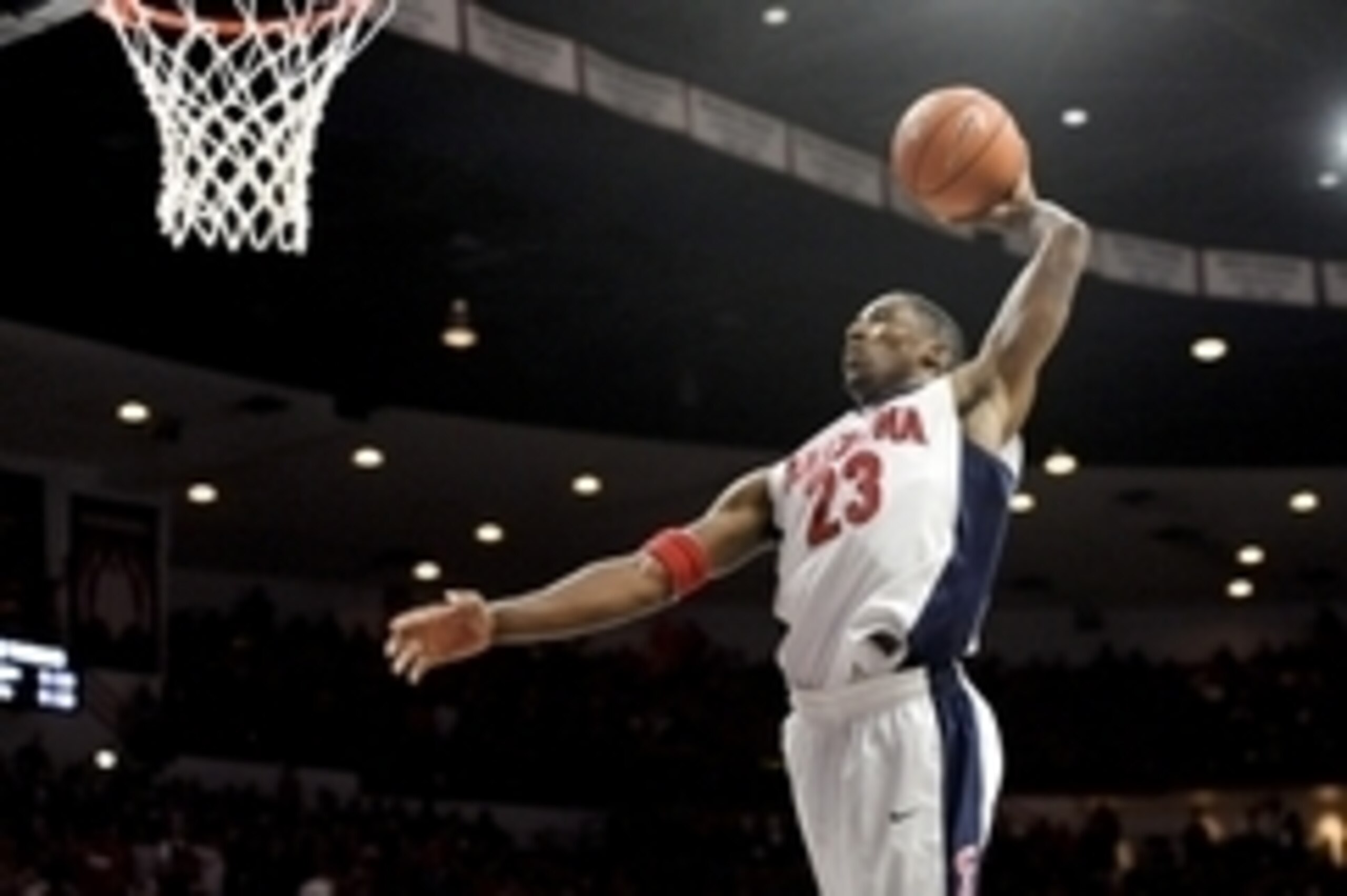 Dec 13, 2014; Tucson, AZ, USA; Arizona Wildcats forward Rondae Hollis-Jefferson (23) dunks the ball against the Michigan Wolverines during the second half at McKale Center. Arizona won 80-53. Mandatory Credit: Casey Sapio-USA TODAY Sports