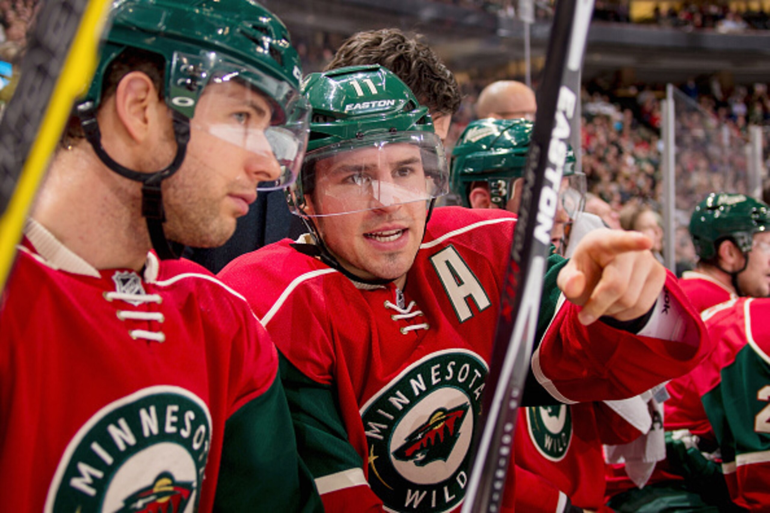 ST. PAUL, MN - DECEMBER 20: (R-L) Zach Parise #11 talks with his Minnesota Wild teammate Jason Pominville #29 during the game against the Nashville Predators on December 20, 2014 at the Xcel Energy Center in St. Paul, Minnesota. (Photo by Bruce Kluckhohn/ ST. PAUL, MN - DECEMBER 20: (R-L) Zach Parise #11 talks with his Minnesota Wild teammate Jason Pominville #29 during the game against the Nashville Predators on December 20, 2014 at the Xcel Energy Center in St. Paul, Minnesota. (Photo by Bruce Kluckhohn/