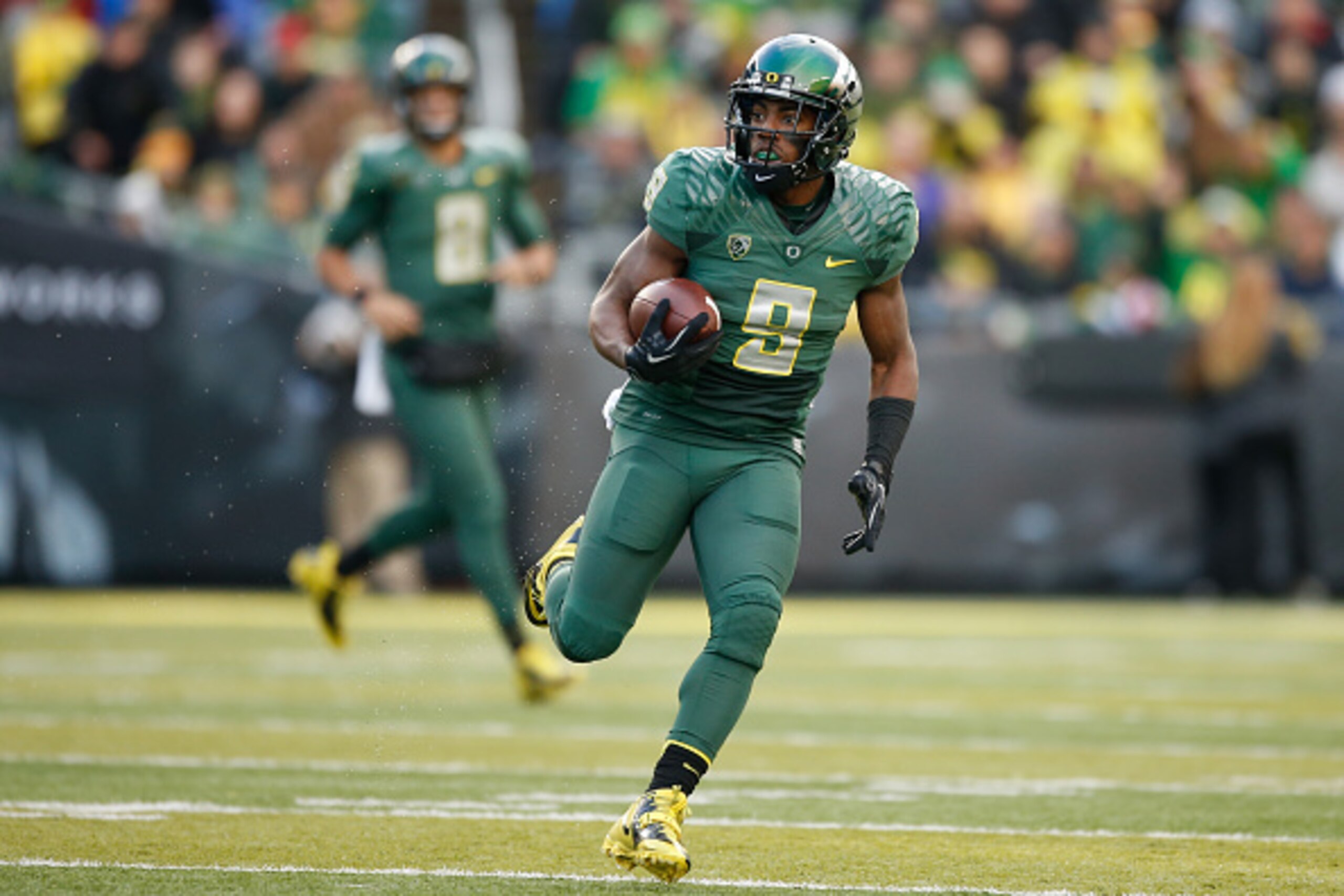EUGENE, OR - NOVEMBER 22: Wide receiver Byron Marshall #9 of the Oregon Ducks rushes against the Colorado Buffaloes at Autzen Stadium on November 22, 2014 in Eugene, Oregon. (Photo by Otto Greule Jr/Getty Images) EUGENE, OR - NOVEMBER 22: Wide receiver Byron Marshall #9 of the Oregon Ducks rushes against the Colorado Buffaloes at Autzen Stadium on November 22, 2014 in Eugene, Oregon. (Photo by Otto Greule Jr/Getty Images)