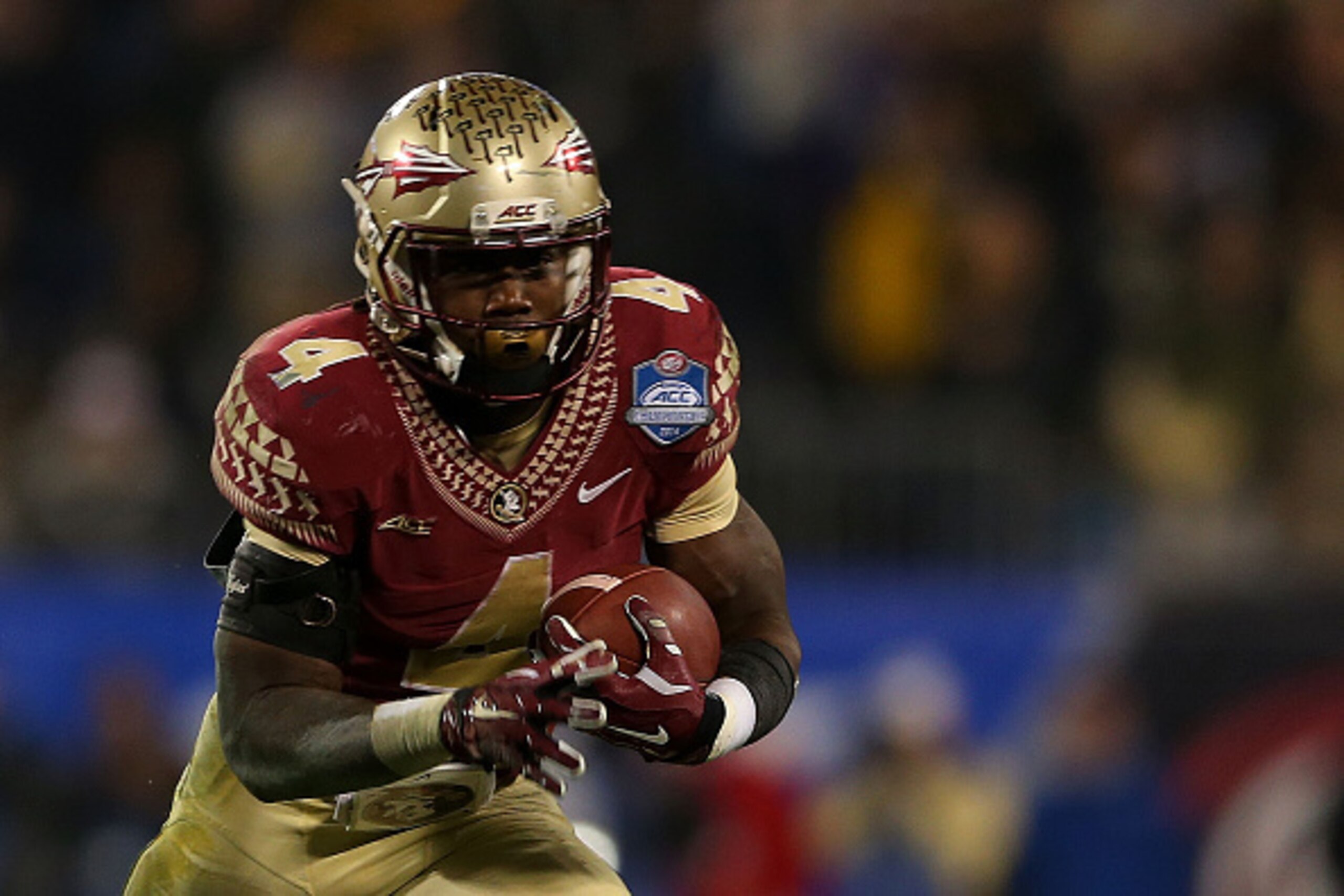 CHARLOTTE, NC - DECEMBER 06: Dalvin Cook #4 of the Florida State Seminoles runs the ball against the Georgia Tech Yellow Jackets in the 3rd quarter during the ACC Championship game on December 6, 2014 in Charlotte, North Carolina. (Photo by Mike Ehrmann/G CHARLOTTE, NC - DECEMBER 06: Dalvin Cook #4 of the Florida State Seminoles runs the ball against the Georgia Tech Yellow Jackets in the 3rd quarter during the ACC Championship game on December 6, 2014 in Charlotte, North Carolina. (Photo by Mike Ehrmann/G