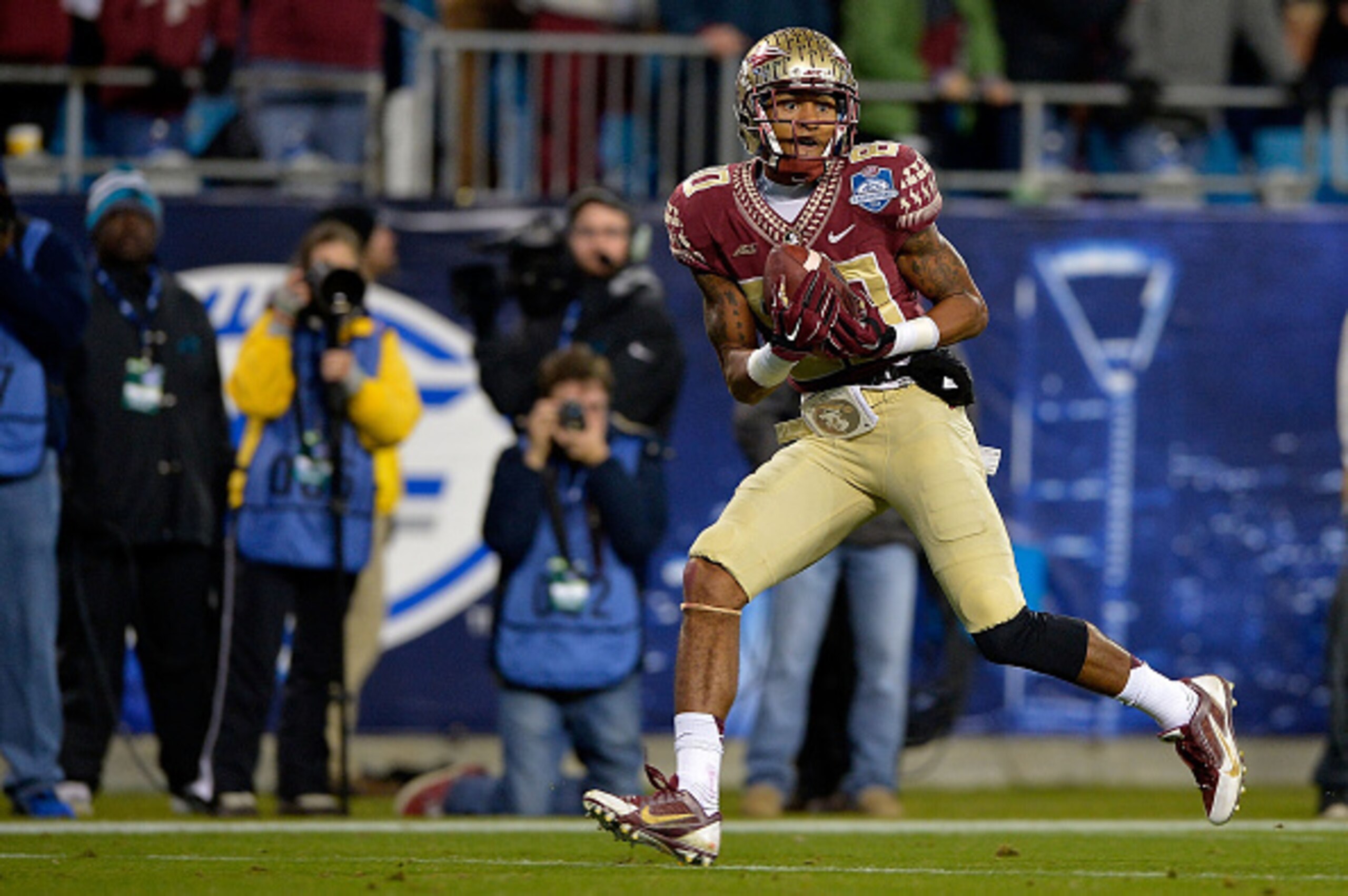 CHARLOTTE, NC - DECEMBER 06: Rashad Greene #80 of the Florida State Seminoles catches a touchdown pass against the Georgia Tech Yellow Jackets during the Atlantic Coast Conference championship game on December 6, 2014 in Greenville, North Carolina. (Pho CHARLOTTE, NC - DECEMBER 06: Rashad Greene #80 of the Florida State Seminoles catches a touchdown pass against the Georgia Tech Yellow Jackets during the Atlantic Coast Conference championship game on December 6, 2014 in Greenville, North Carolina. (Pho