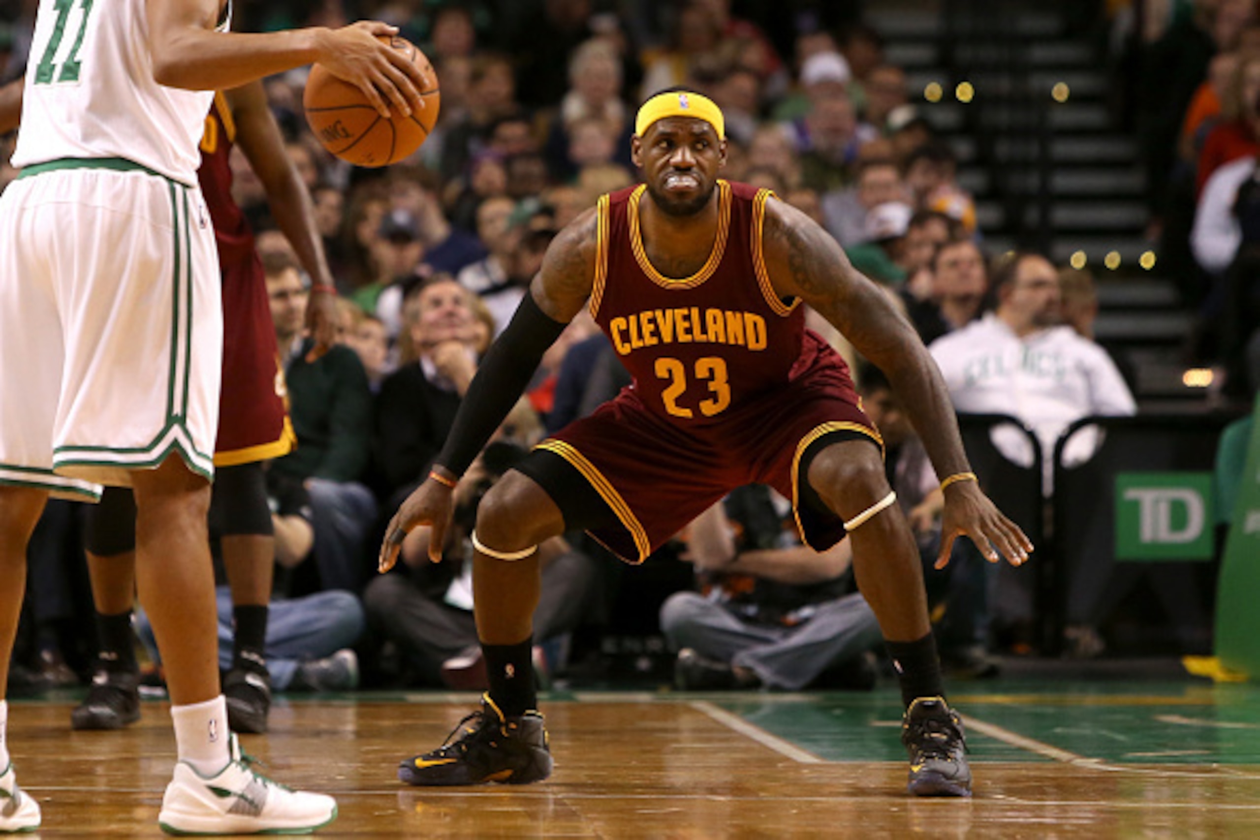 BOSTON, MA - NOVEMBER 14: LeBron James #23 of the Cleveland Cavaliers defends Evan Turner #11 of the Boston Celtics at TD Garden on November 14, 2014 in Boston, Massachusetts. NOTE TO USER: User expressly acknowledges and agrees that, by downloading and o