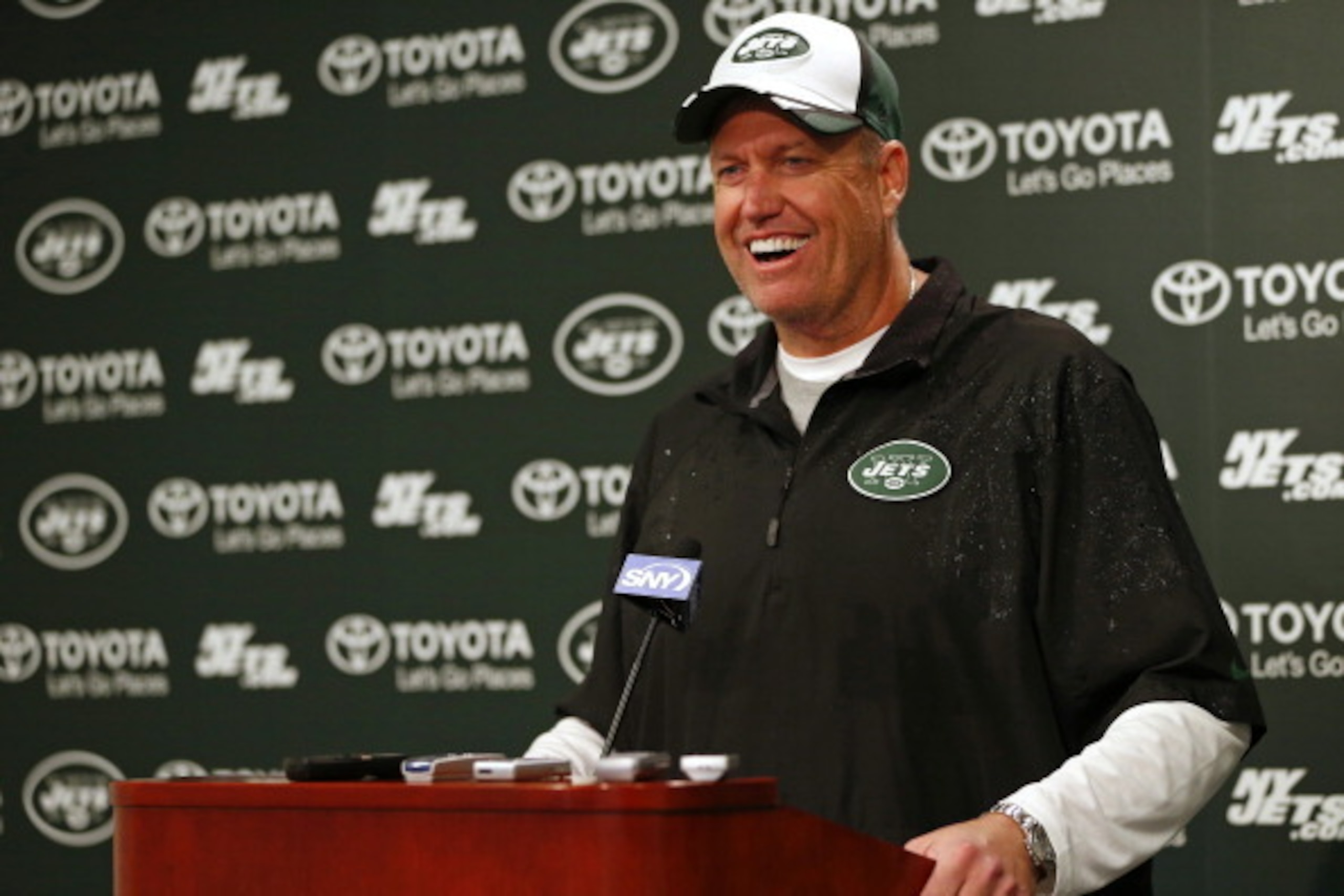 FLORHAM PARK, NJ - MAY 16: Head Coach Rex Ryan of the New York Jets talks with the media after their first day of rookie minicamp on May 16, 2014 in Florham Park, New Jersey. (Photo by Rich Schultz /Getty Images)