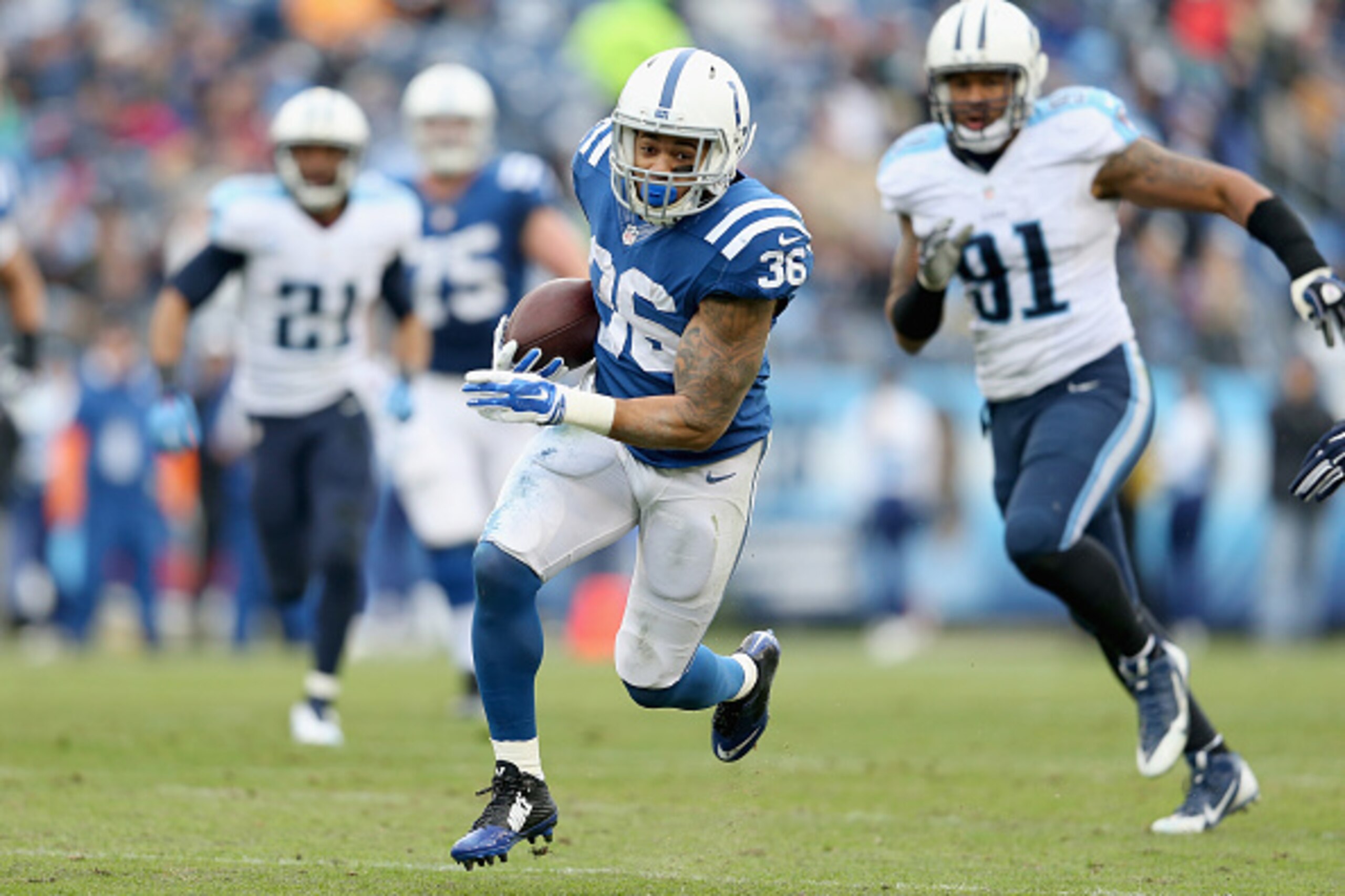 NASHVILLE, TN - DECEMBER 28:  Daniel Herron #36 of the Indianapolis Colts runs with the ball during the game against the Tennessee Titans at LP Field on December 28, 2014 in Nashville, Tennessee.  (Photo by Andy Lyons/Getty Images)