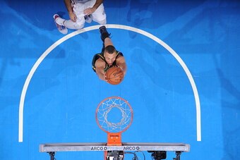 LOS ANGELES, CA - DECEMBER 29: Dante Exum #11 of the Utah Jazz dunks against the Los Angeles Clippers on December 29, 2014 at STAPLES Center in Los Angeles, California. NOTE TO USER: User expressly acknowledges and agrees that, by downloading and/or using