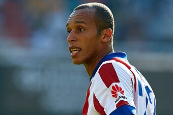 VALENCIA, SPAIN - OCTOBER 04:  Miranda of Atletico de Madrid reacts during the La Liga match between Valencia CF and Club Atletico de Madrid at Estadi de Mestalla on October 4, 2014 in Valencia, Spain.  (Photo by Manuel Queimadelos Alonso/Getty Images)