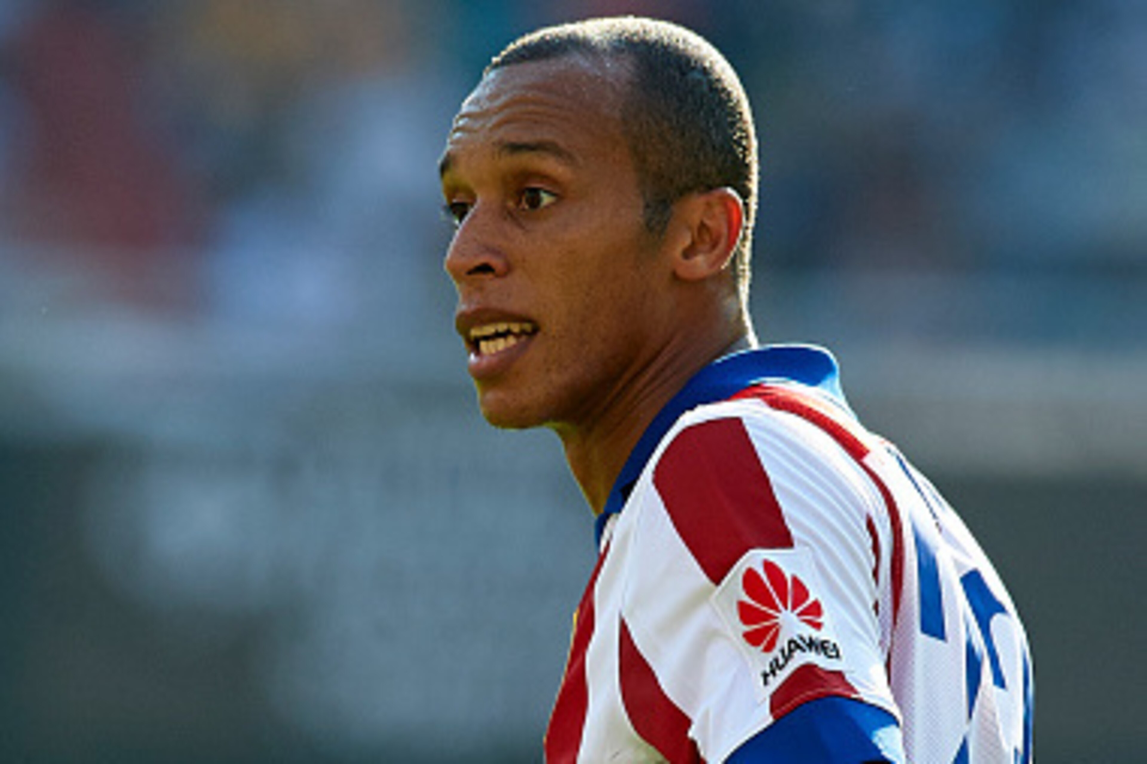 VALENCIA, SPAIN - OCTOBER 04:  Miranda of Atletico de Madrid reacts during the La Liga match between Valencia CF and Club Atletico de Madrid at Estadi de Mestalla on October 4, 2014 in Valencia, Spain.  (Photo by Manuel Queimadelos Alonso/Getty Images)