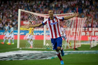 MADRID, SPAIN - AUGUST 30:  Joao Miranda of Atletico de Madrid celebrates scoring their opening goal during the La Liga match between Club Atletico de Madrid and SD Eibar at Vicente Calderon Stadium on August 30, 2014 in Madrid, Spain.  (Photo by Gonzalo 