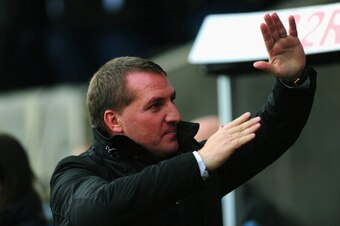 SWANSEA, WALES - NOVEMBER 25:  Liverpool manager Brendan Rodgers waves to the crowd before the Barclays Premier League match between Swansea City and Liverpool at Liberty Stadium on November 25, 2012 in Swansea, Wales.  (Photo by Stu Forster/Getty Images)