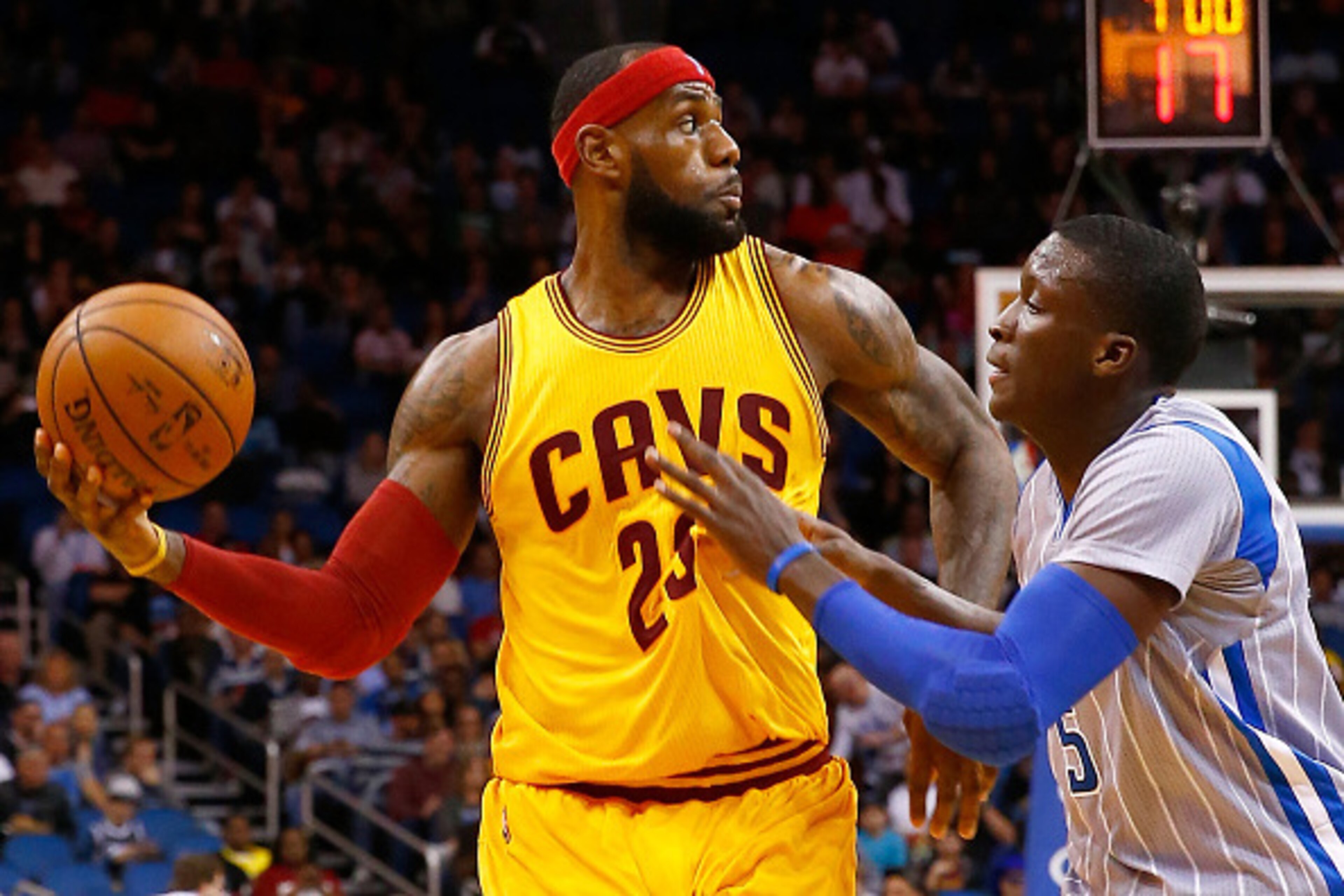 ORLANDO, FL - DECEMBER 26:  Cleveland Cavaliers forward LeBron James #23 looks to make a pass against Orlando Magic guard Victor Oladipo #5 during the game at Amway Center on December 26, 2014 in Orlando, Florida.  (Photo by Sam Greenwood/Getty Images)