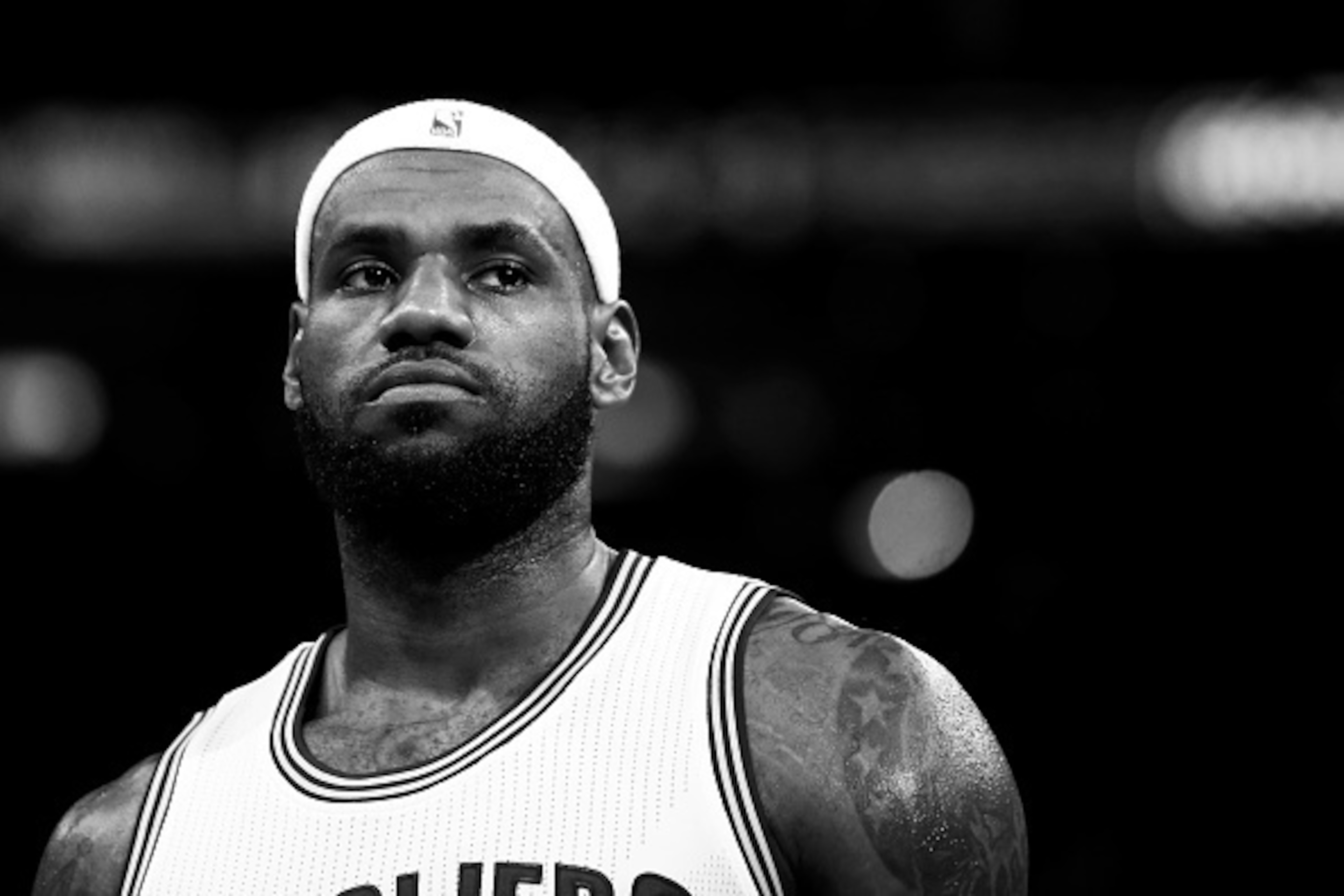 CLEVELAND, OH - DECEMBER 23: (EDITORS NOTE: THIS IMAGE HAS BEEN CONVERTED TO BLACK AND WHITE)  LeBron James #23 of the Cleveland Cavaliers looks on in the second half against the Minnesota Timberwolves at Quicken Loans Arena on December 23, 2014 in Clevel