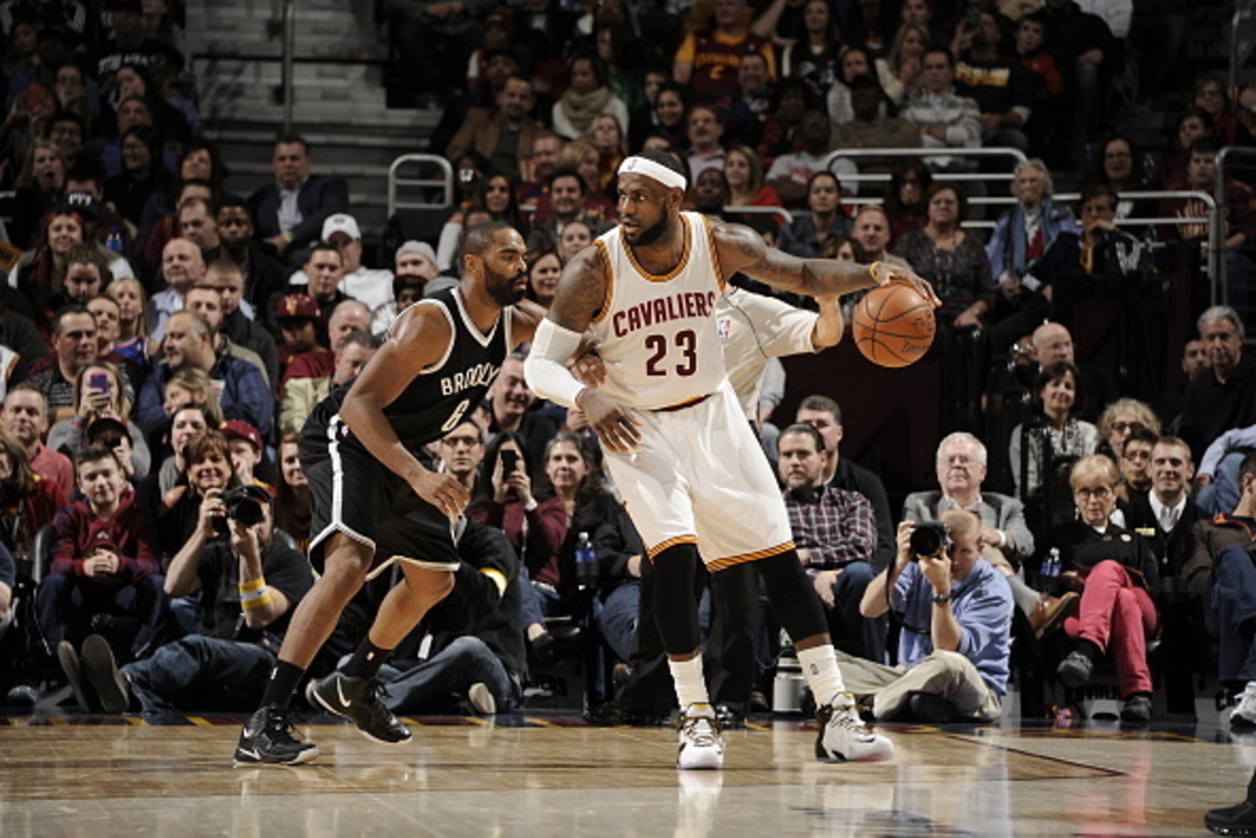 CLEVELAND, OH - DECEMBER 19:  LeBron James #23 of the Cleveland Cavaliers handles the ball against the Brooklyn Nets during the game on December 19, 2014 at Quicken Loans Arena in Cleveland, Ohio. NOTE TO USER: User expressly acknowledges and agrees that,