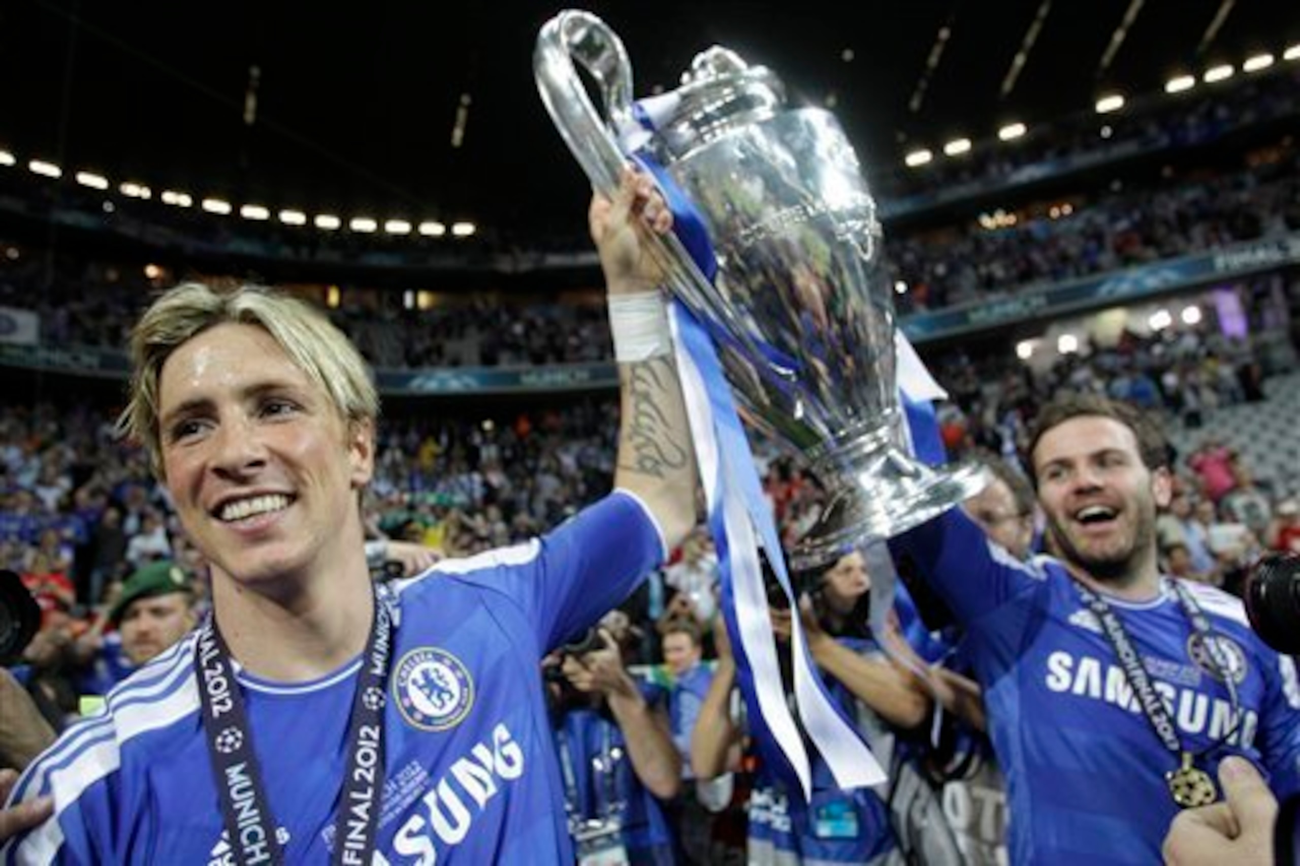 Fernando Torres celebrates winning the Champions League.