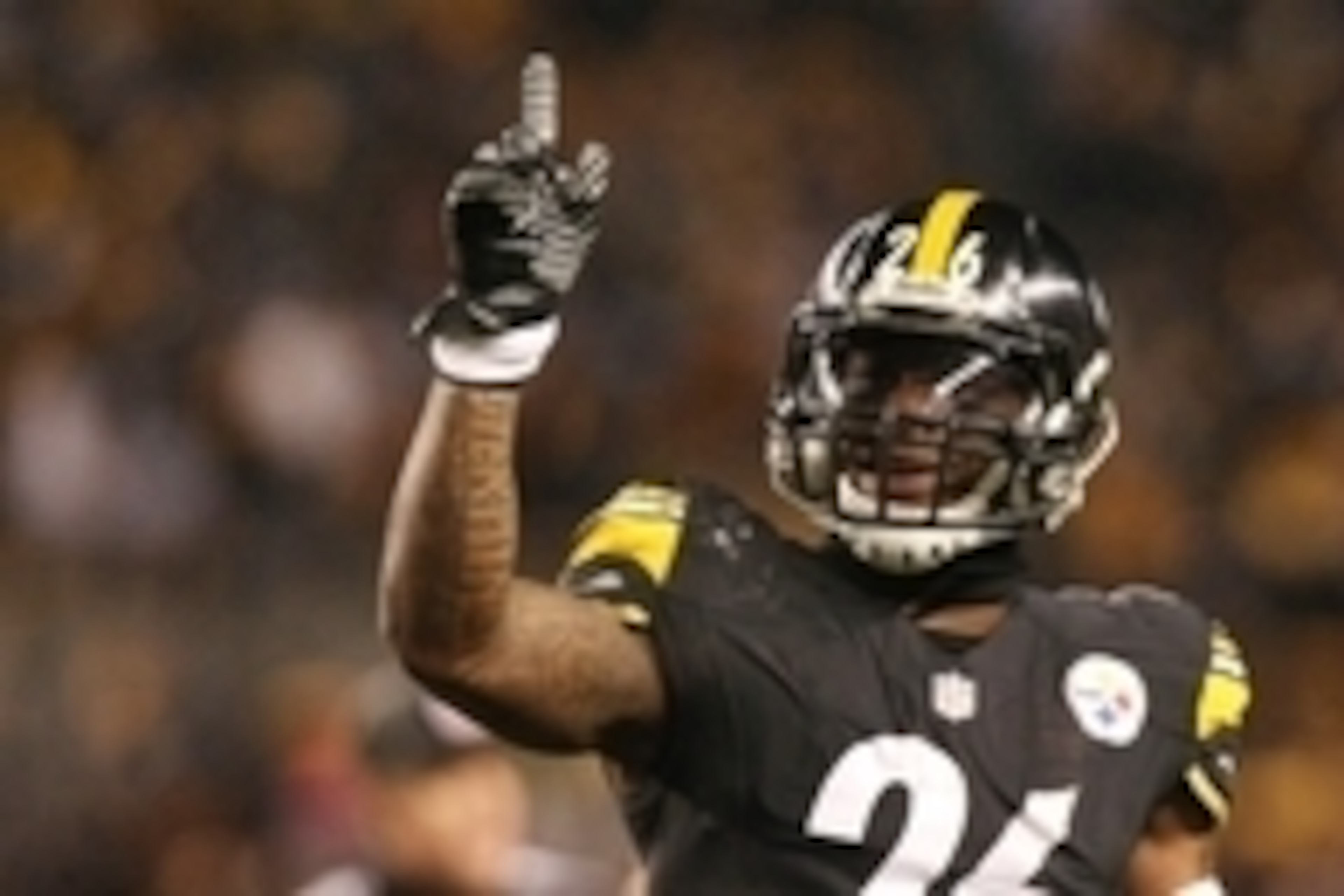Dec 28, 2014; Pittsburgh, PA, USA; Pittsburgh Steelers running back Le'Veon Bell (26) celebrates a first down against the Cincinnati Bengals in the first half at Heinz Field. Mandatory Credit: Jason Bridge-USA TODAY Sports