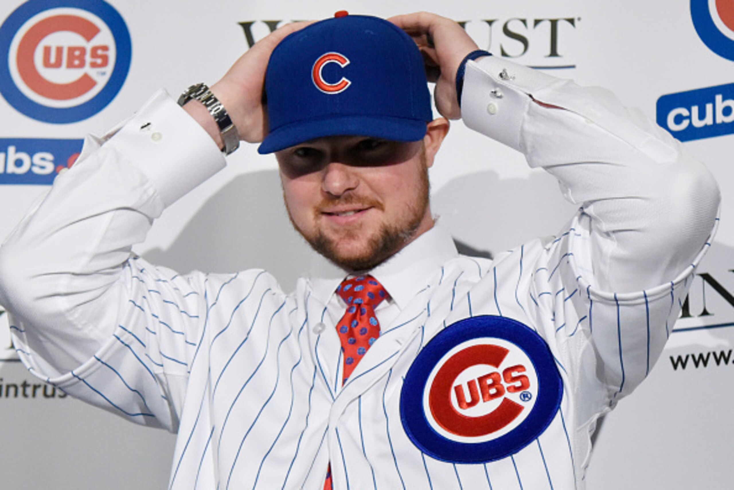 CHICAGO, IL - DECEMBER 15: Pitcher Jon Lester puts on a Cubs hat during an introduction press conference by the Chicago Cubs on December 15, 2014 in Chicago, Illinois. (Photo by David Banks/Getty Images) CHICAGO, IL - DECEMBER 15: Pitcher Jon Lester puts on a Cubs hat during an introduction press conference by the Chicago Cubs on December 15, 2014 in Chicago, Illinois. (Photo by David Banks/Getty Images)
