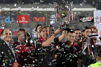 Milan celebrate the win.