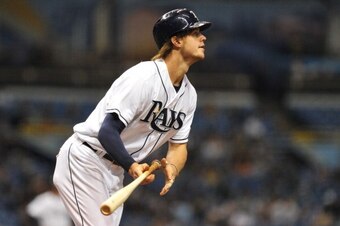 ST. PETERSBURG, FL - SEPTEMBER 16:  Outfielder Wil Myers #9 of the Tampa Bay Rays homers to lead off the 2nd inning against the Texas Rangers September 16, 2013 at Tropicana Field in St. Petersburg, Florida. (Photo by Al Messerschmidt/Getty Images)