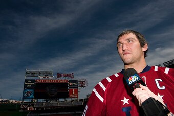 WASHINGTON, DC - SEPTEMBER 23:  Alex Ovechkin of the Washington Capitals speaks to members of the media after a press conference for the 2015 Bridgestone NHL Winter Classic at Nationals Park on September 23, 2014 in Washington, DC.  (Photo by Patrick McDe