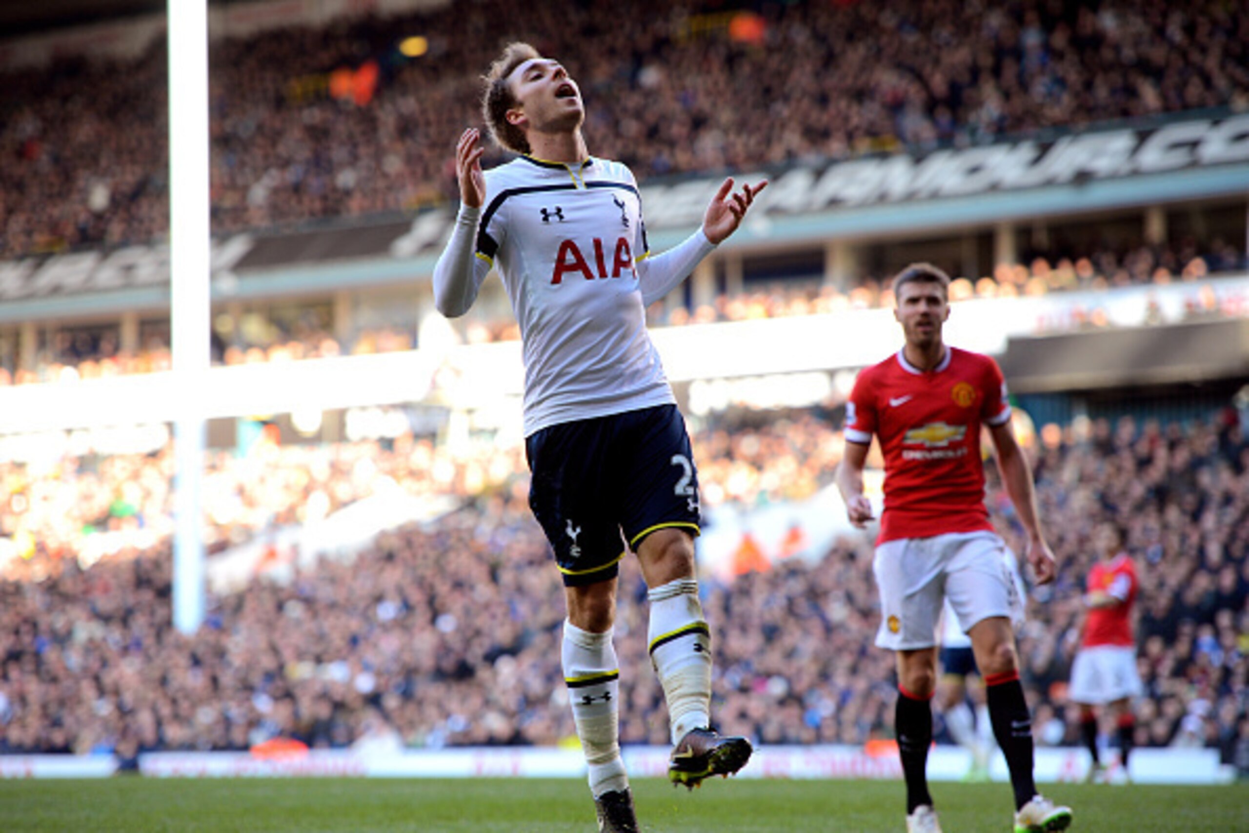 LONDON, ENGLAND - DECEMBER 28:  Christian Eriksen of Spurs reacts after a missed chance on goal during the Barclays Premier League match between Tottenham Hotspur and Manchester United at White Hart Lane on December 28, 2014 in London, England.  (Photo by