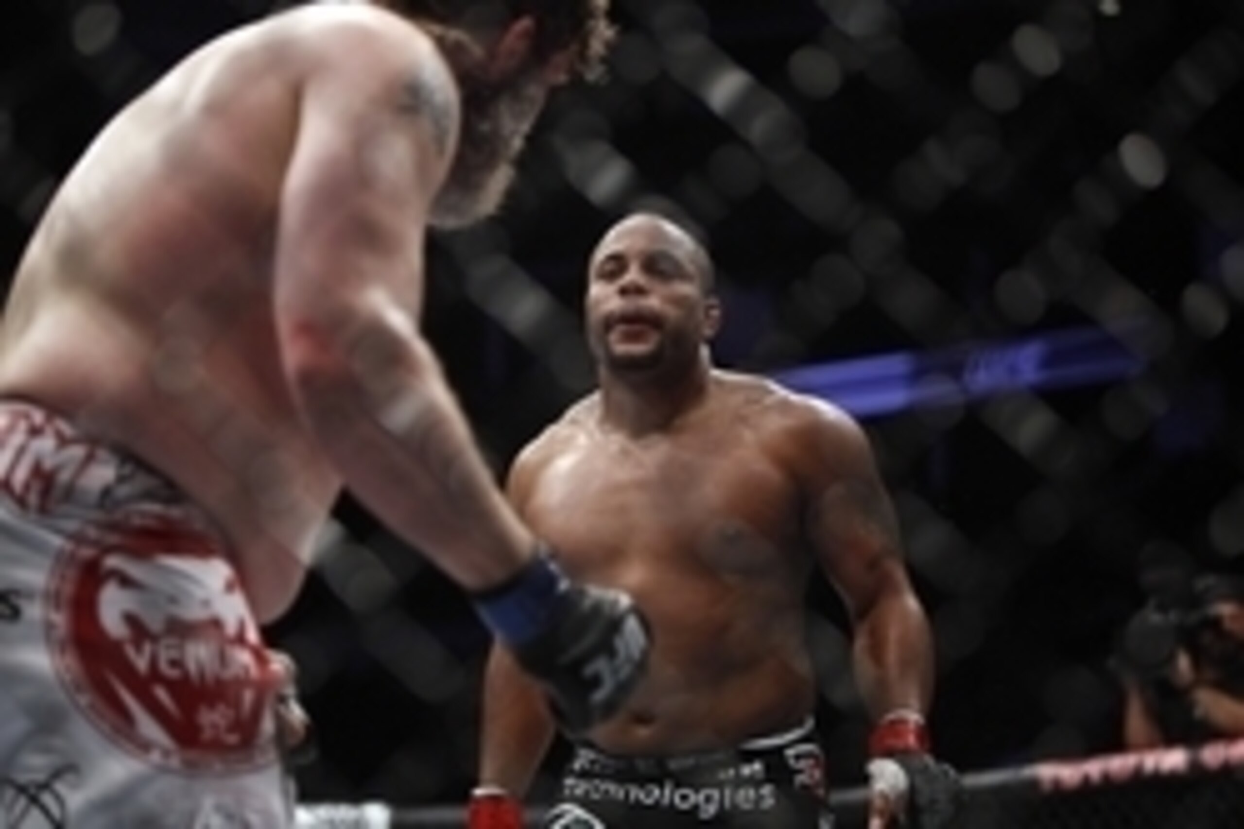 Oct 19, 2013; Houston, TX, USA; Daniel Cormier (red gloves) fights against Roy Nelson (blue gloves) in their heavyweight bout during UFC 166 at Toyota Center. Mandatory Credit: Andrew Richardson-USA TODAY Sports
